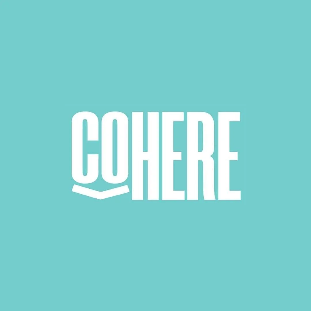 Light blue background with the word 'COHERE' in white, stylized text.