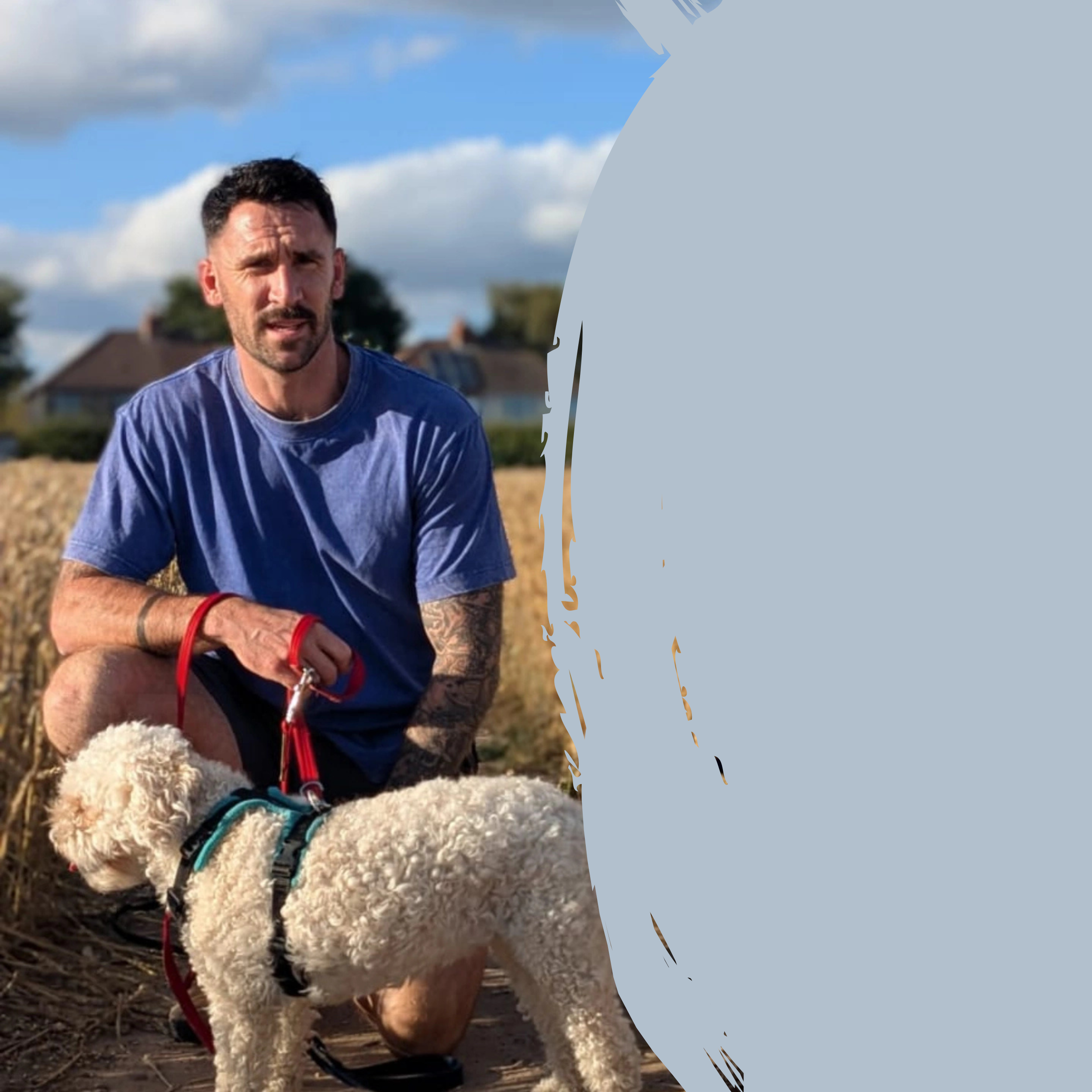 A man running outdoors with a fluffy white dog on a leash, during daytime with partly cloudy sky and houses in the background.