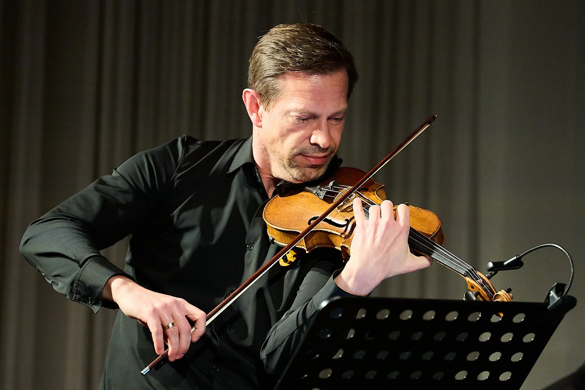 A man playing the violin.