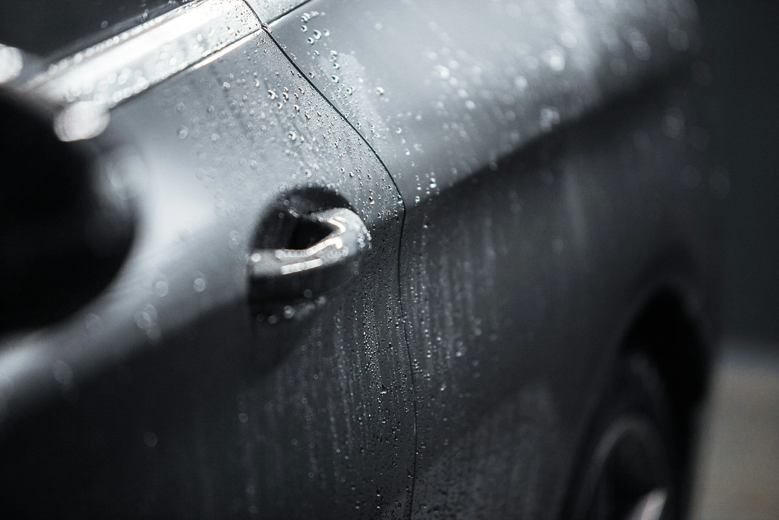 Professional vehicle care facilities supported by site and franchise partnerships