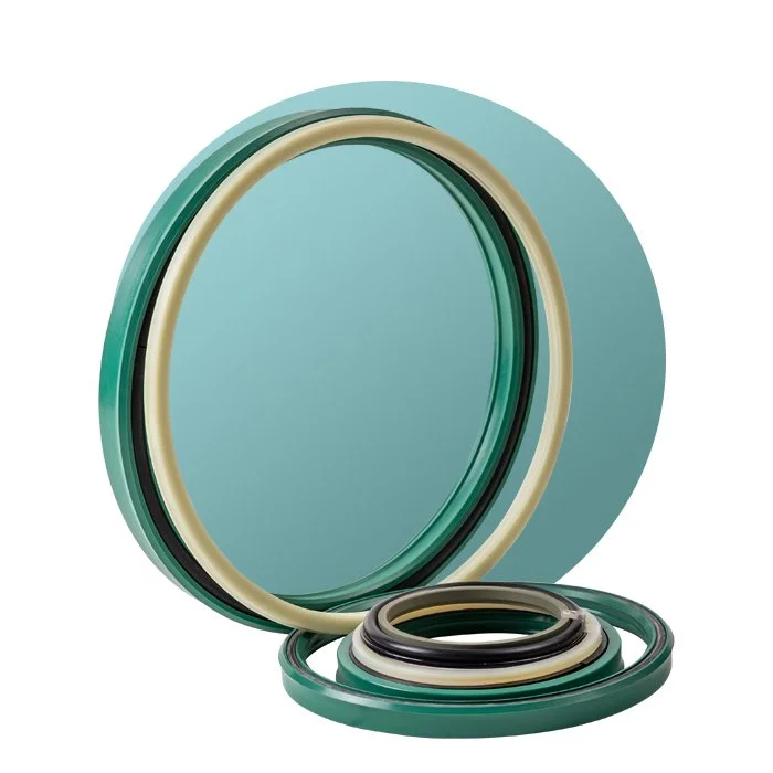 Set of various sizes of rubber or silicone O-rings and gaskets in shades of green, black, and beige.