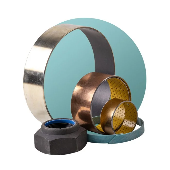 Various bearings, a large metallic ring, and a bolt with a blue gasket in front.