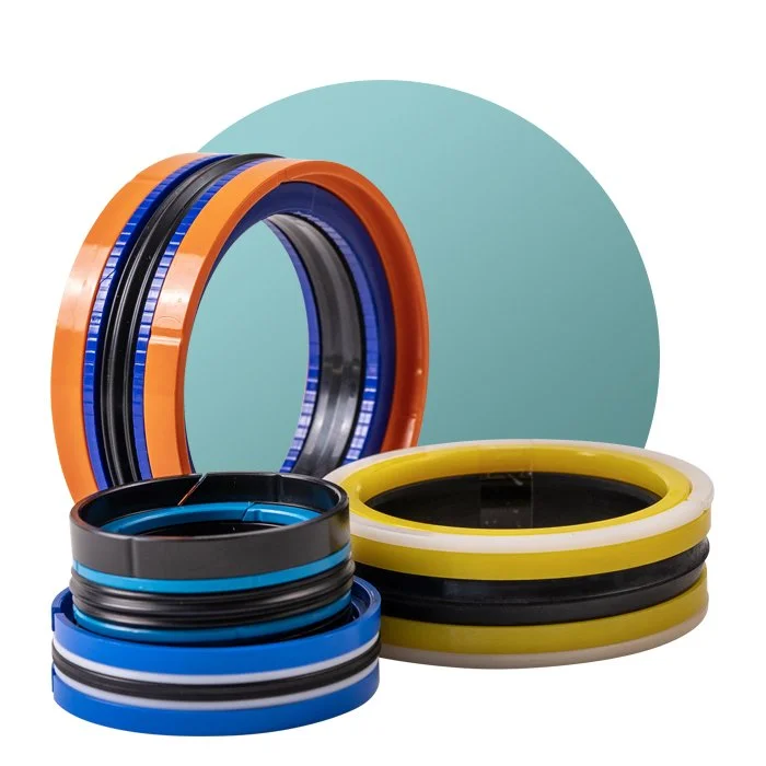 Colorful mechanical seals and o-rings stacked on a reflective surface with a blue circular background.