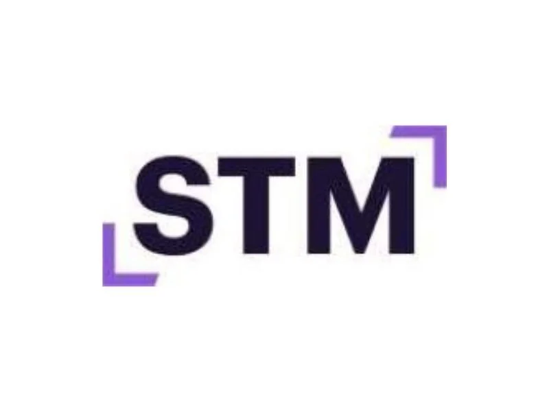 The logo of STM, featuring black letters with purple corner accents on a white background.