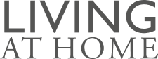 Text mit den Worten 'LIVING AT HOME' auf schwarzem Hintergrund