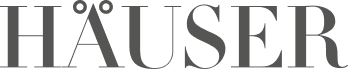 Der Schriftzug 'HÄUSER' in schwarzer Schrift auf weißem Hintergrund.