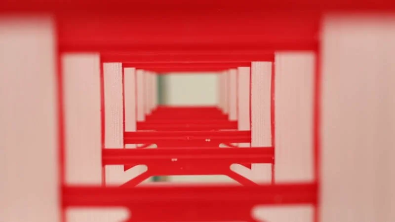 Close-up of red ICF block spacing