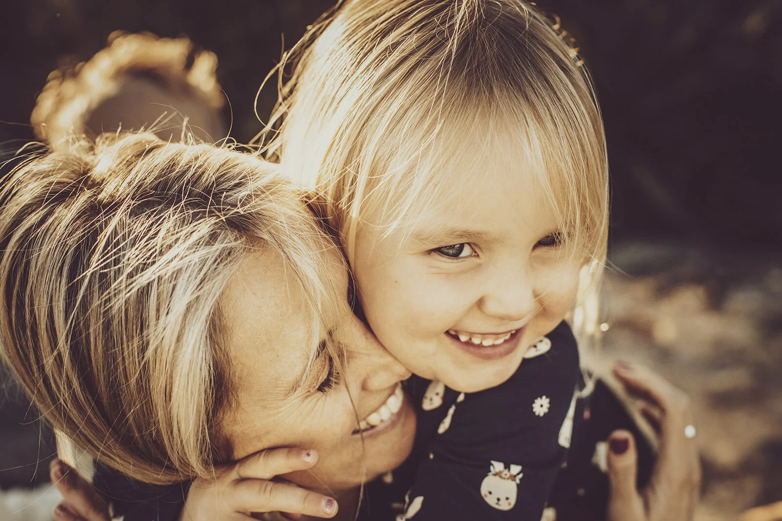 Little Manly Photography Mother and Daughter hugging and laughing