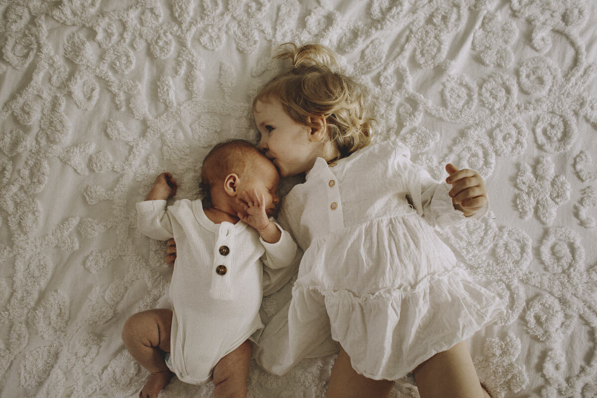 Photographing Newborns – to pose or not to pose? It’s a No from us