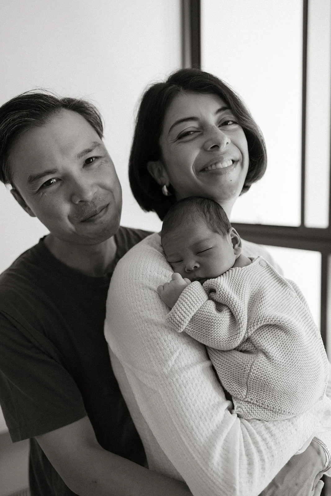 New parents with newborn baby