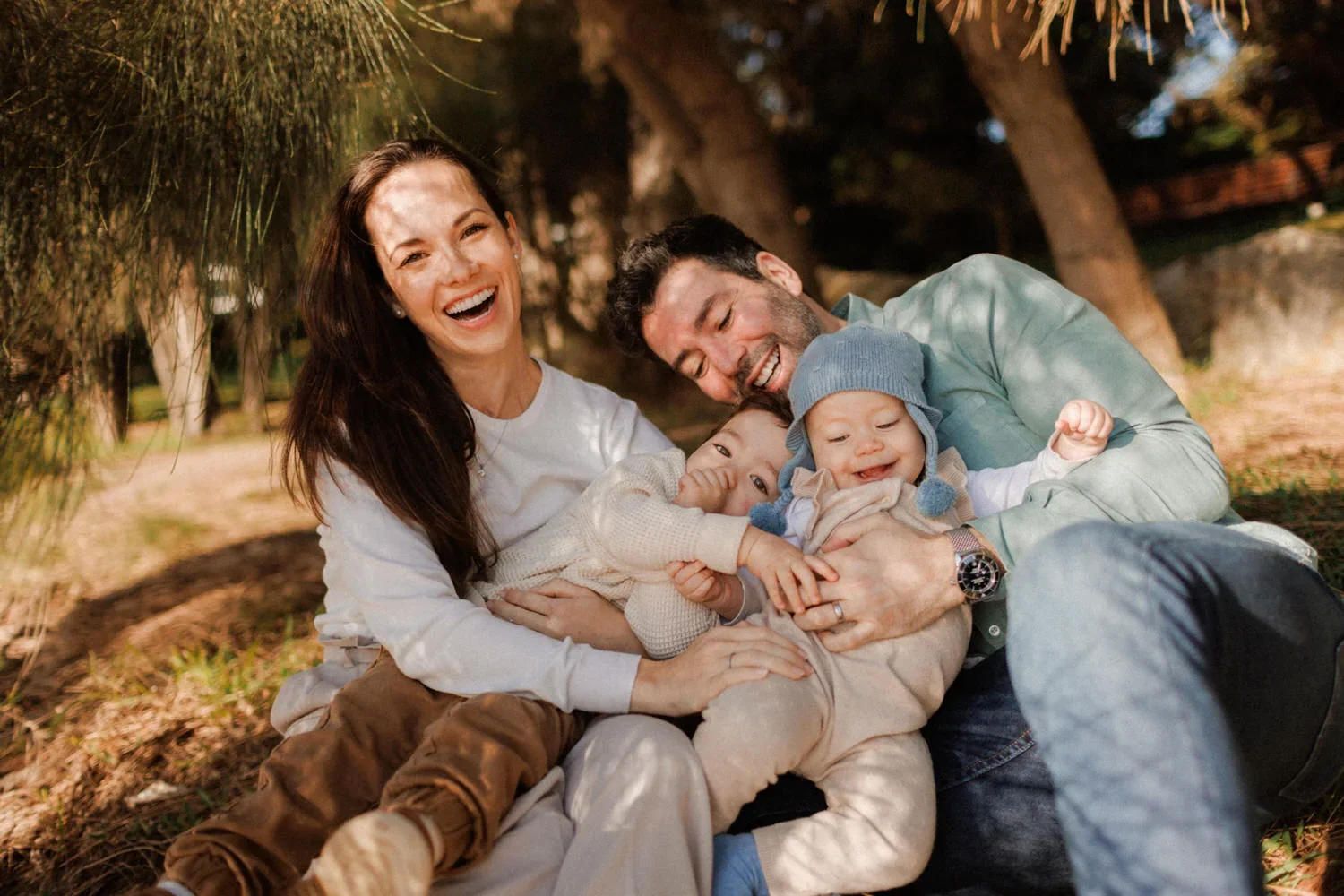 01-little-manly-family-laughter-garden.webp