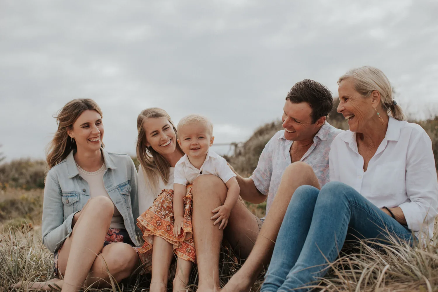 07-little-manly-multigenerational-family-coastal-grass.webp