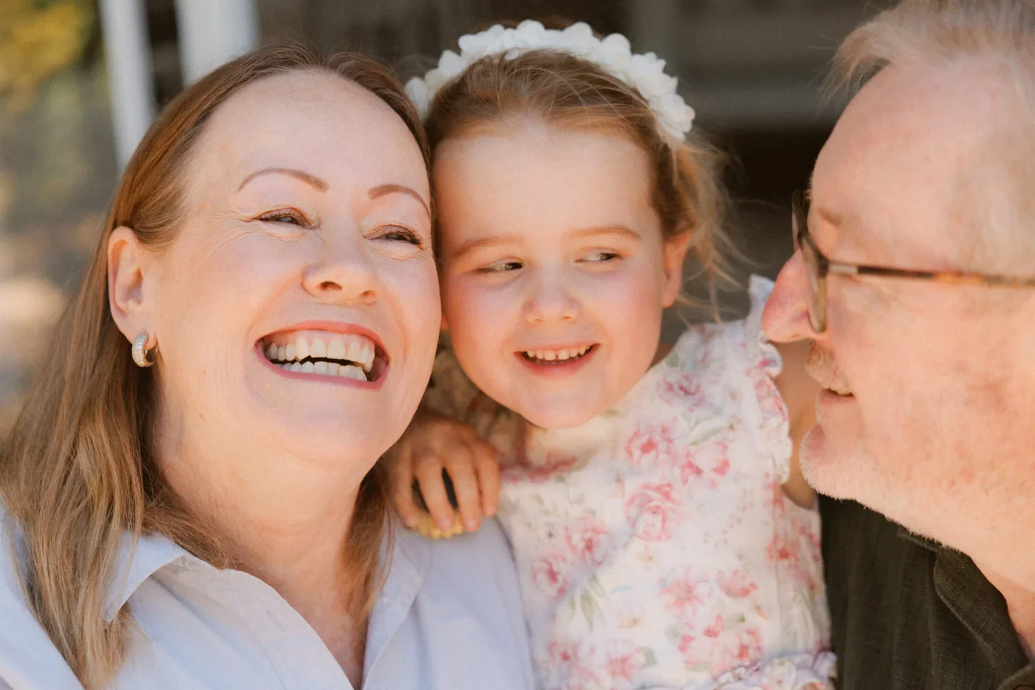 22-little-manly-parents-daughter-laughing-close-up.webp