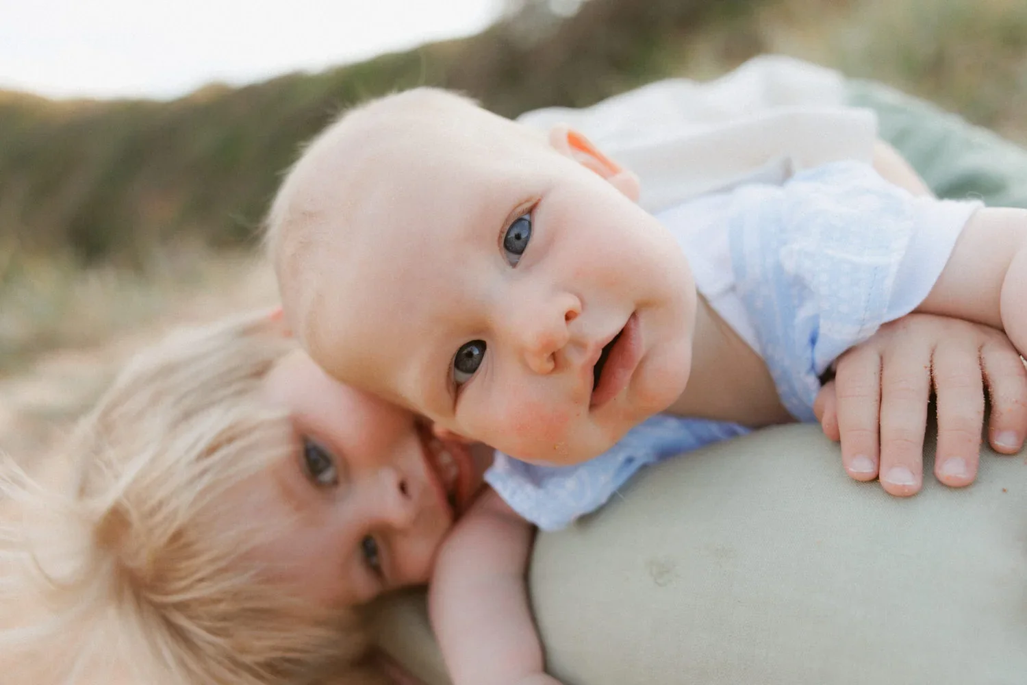 27-little-manly-siblings-close-up-outdoors.webp