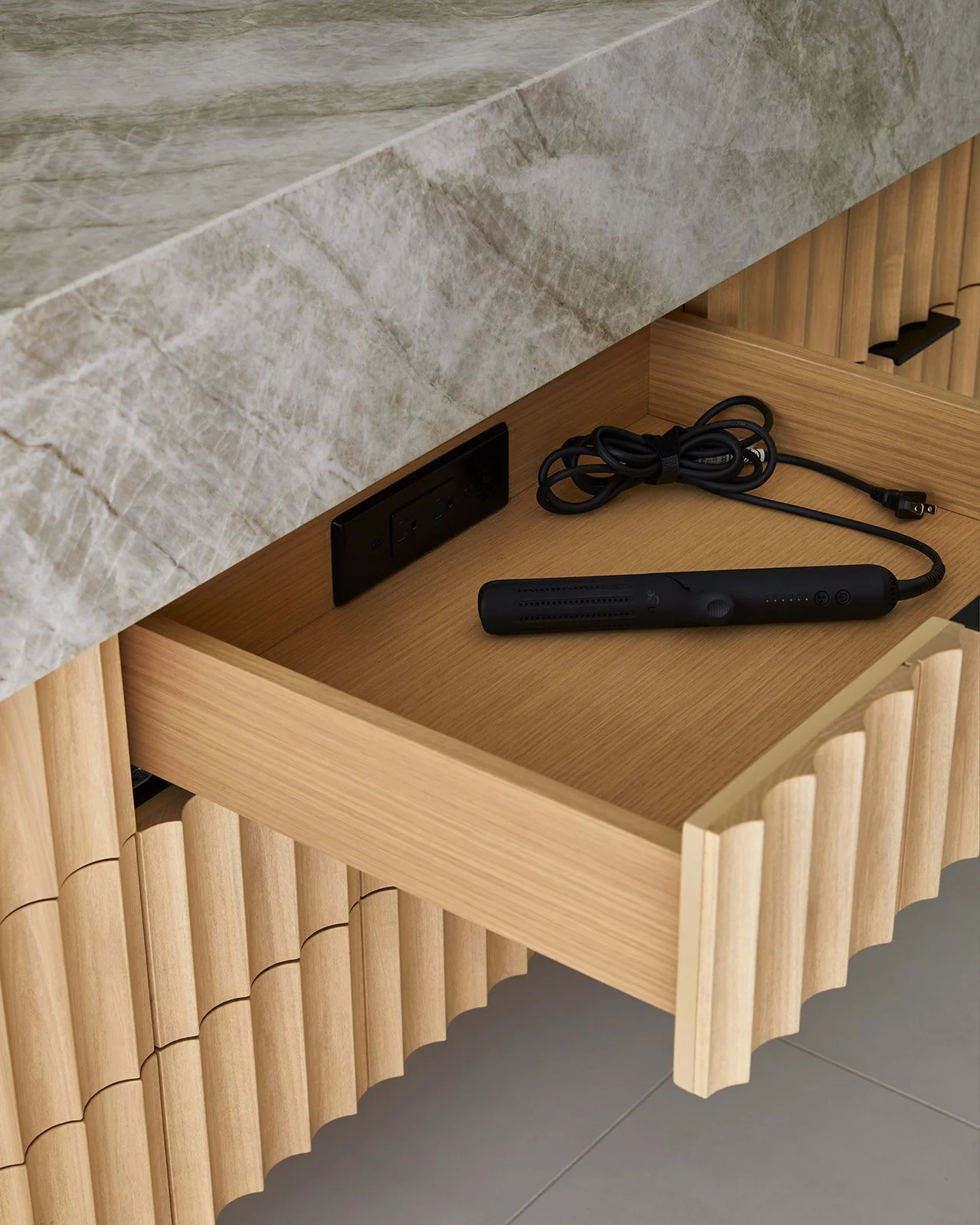 KeeleyMcCleary_BloorWest-ensuite-vanity-drawer-outlet.jpg