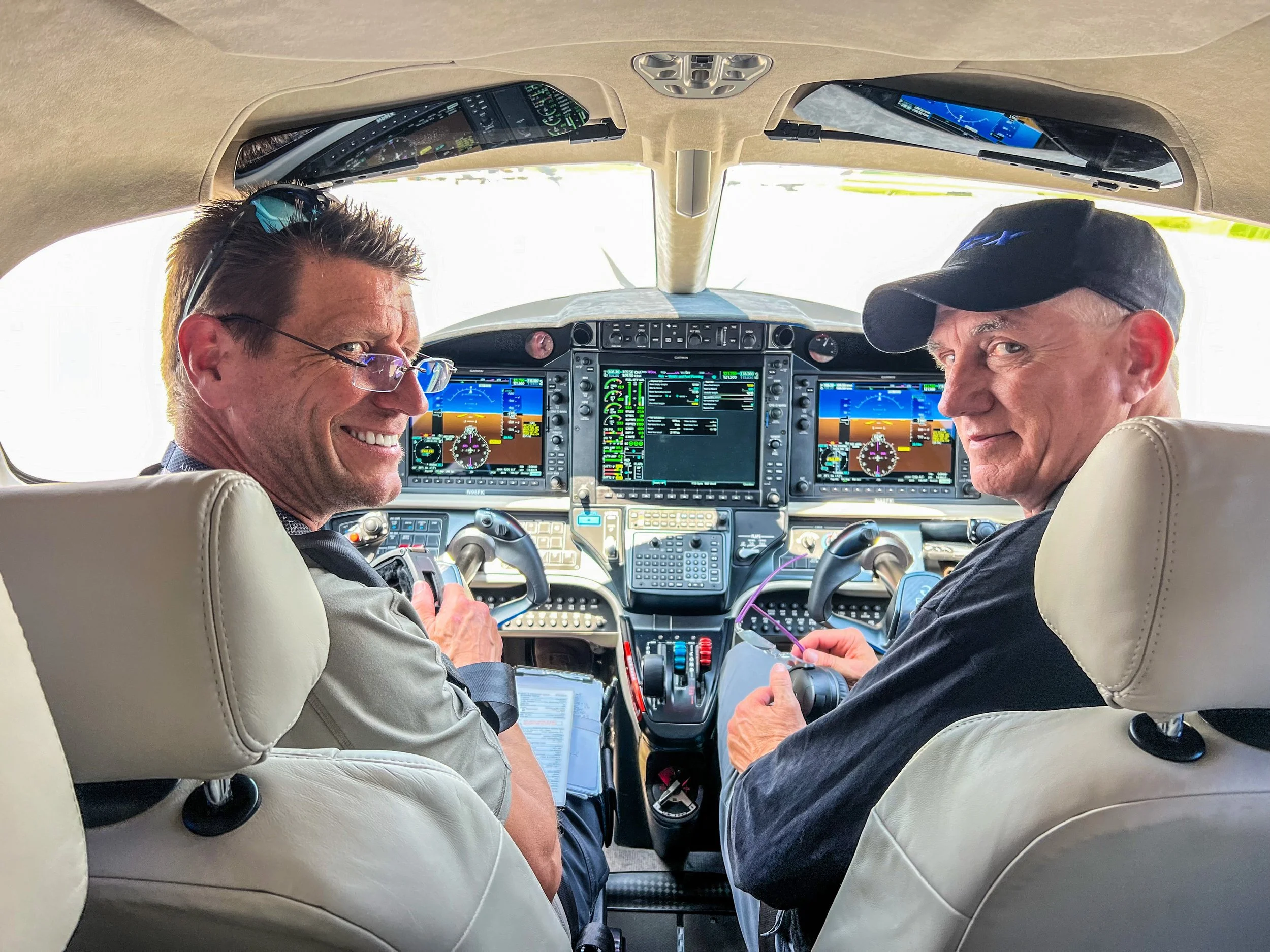 Tim Decker providing one-on-one owner-pilot mentorship and advanced IFR instruction in a modern glass cockpit turbine aircraft.