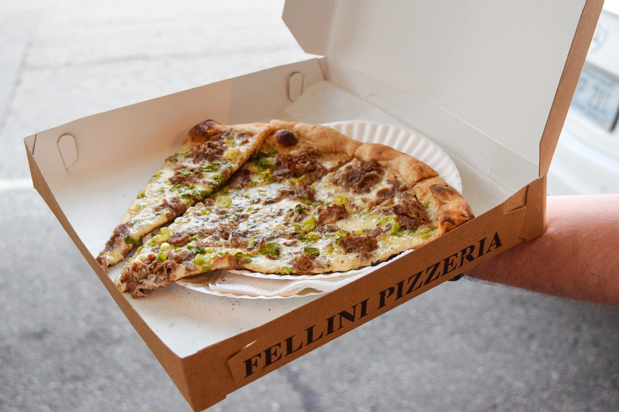 Award-winning specialty pizza from Fellini's on the Providence Fox Point food tour