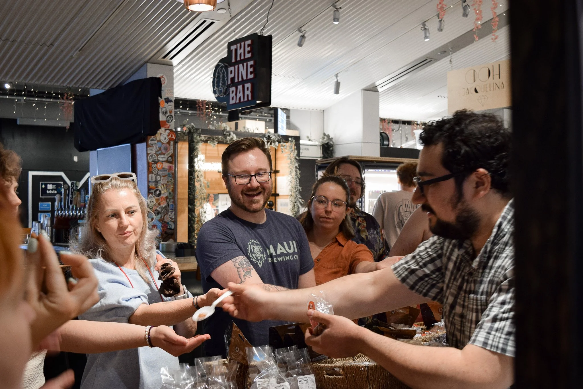 Seasonal nut tasting at Q's Nuts inside Boston Public Market on the North End food tour