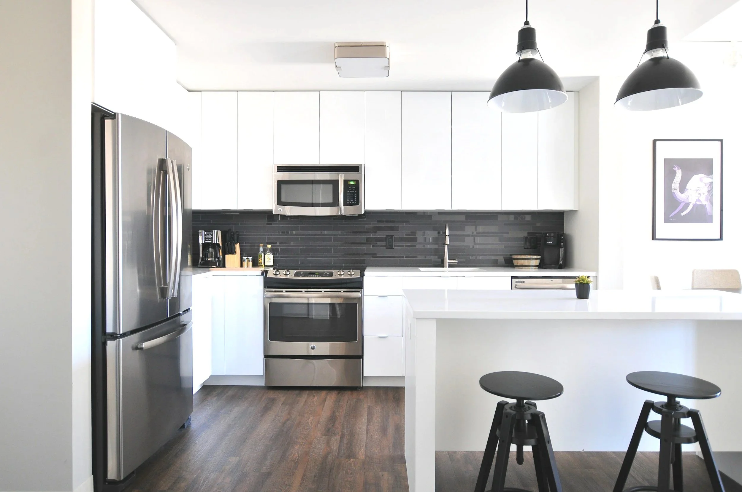 Clean modern kitchen with spotless countertops and appliances