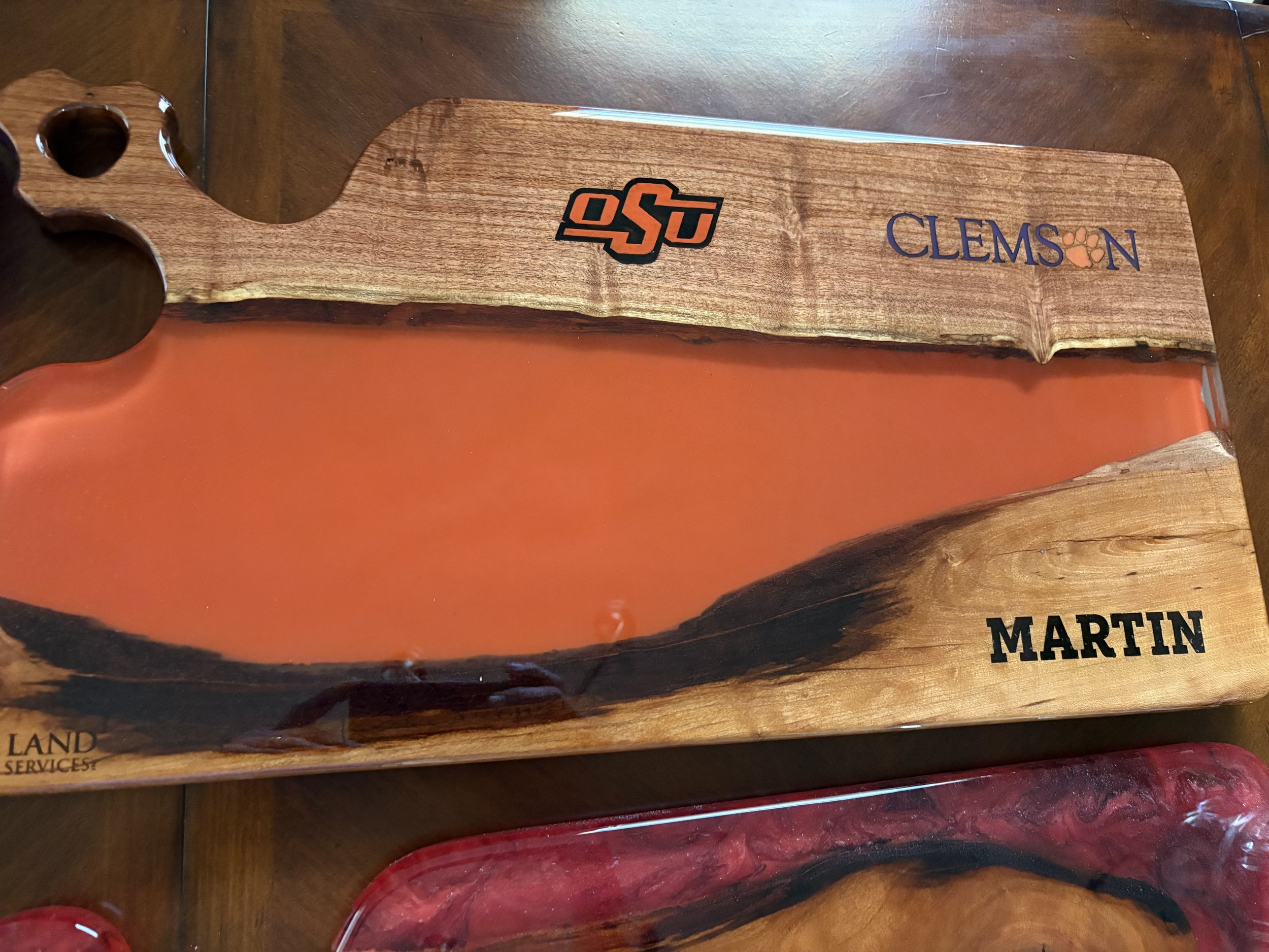 Custom cypress charcuterie board w/ orange epoxy
