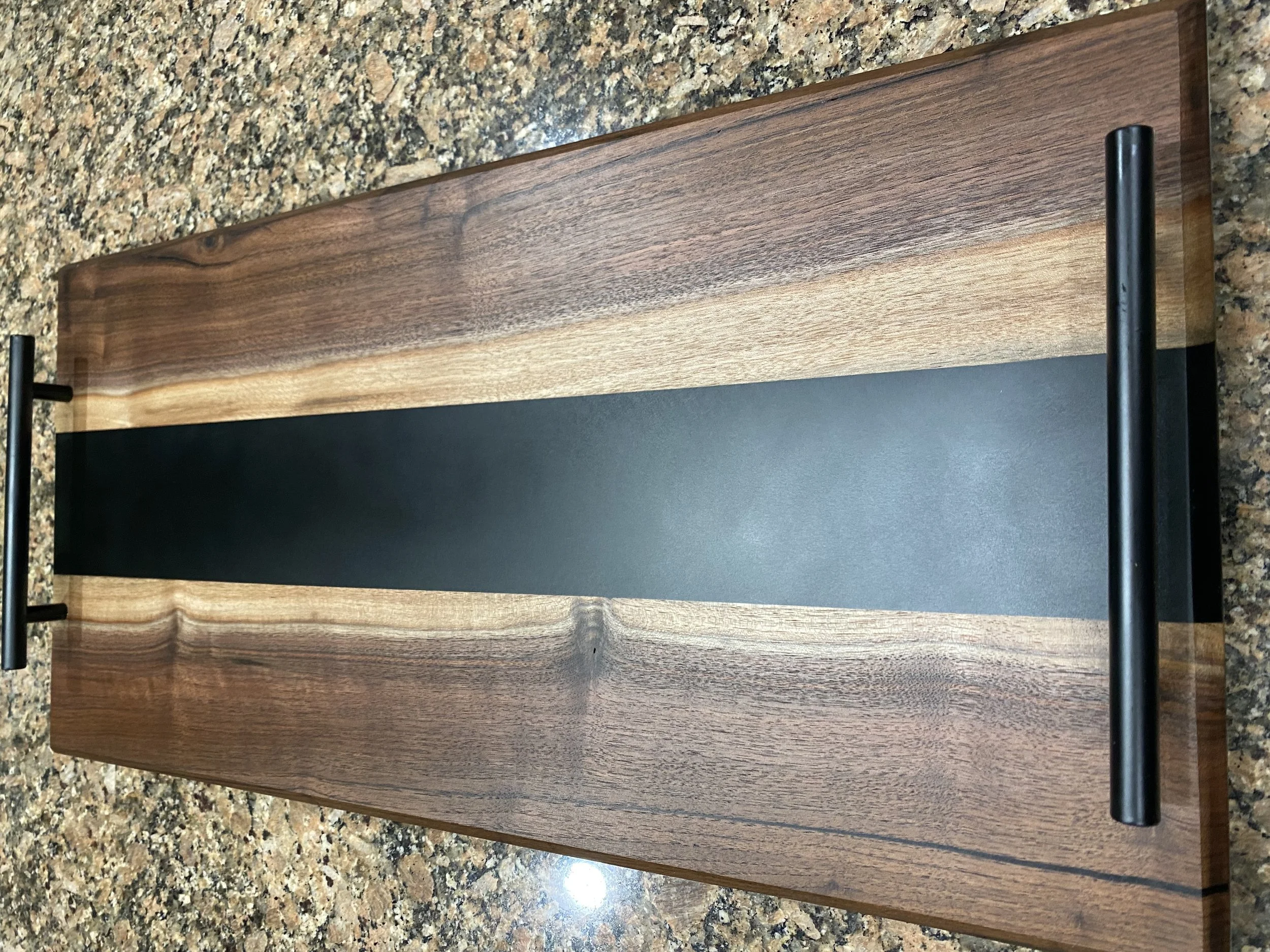 Walnut charcuterie board with black epoxy