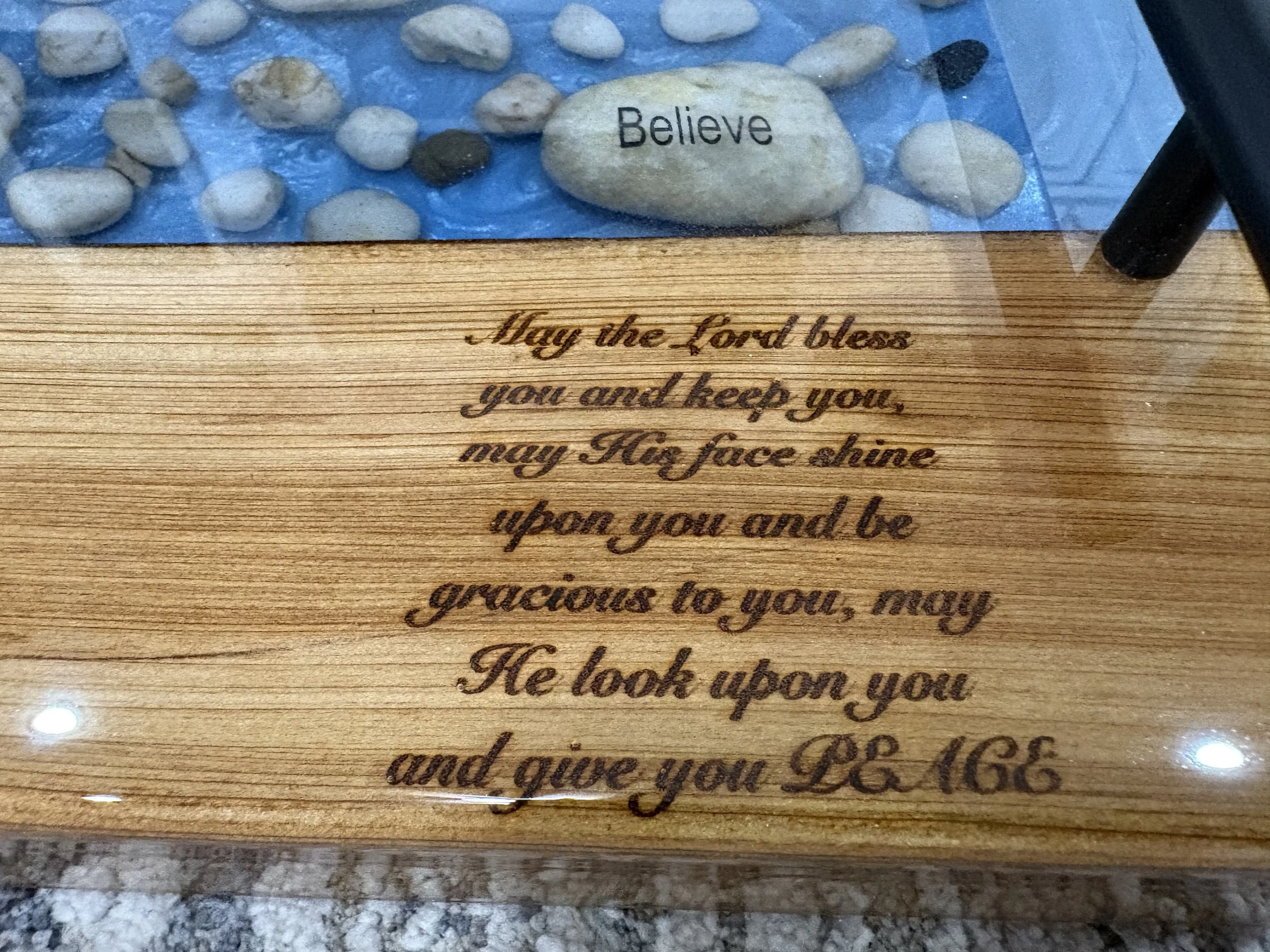 Custom cypress charcuterie board w/ blue epoxy and faith rocks