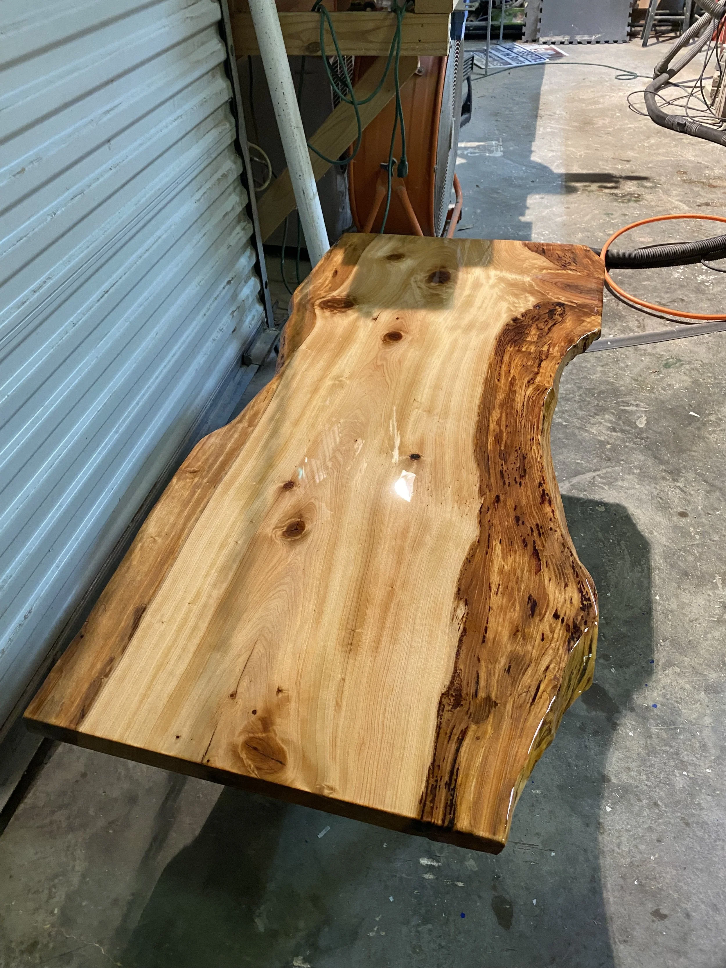 Cypress coffee table with clear epoxy