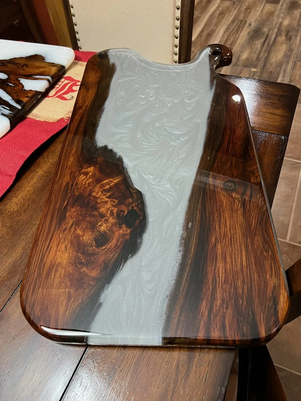 sinker cypress charcuterie board with grey swirl epoxy