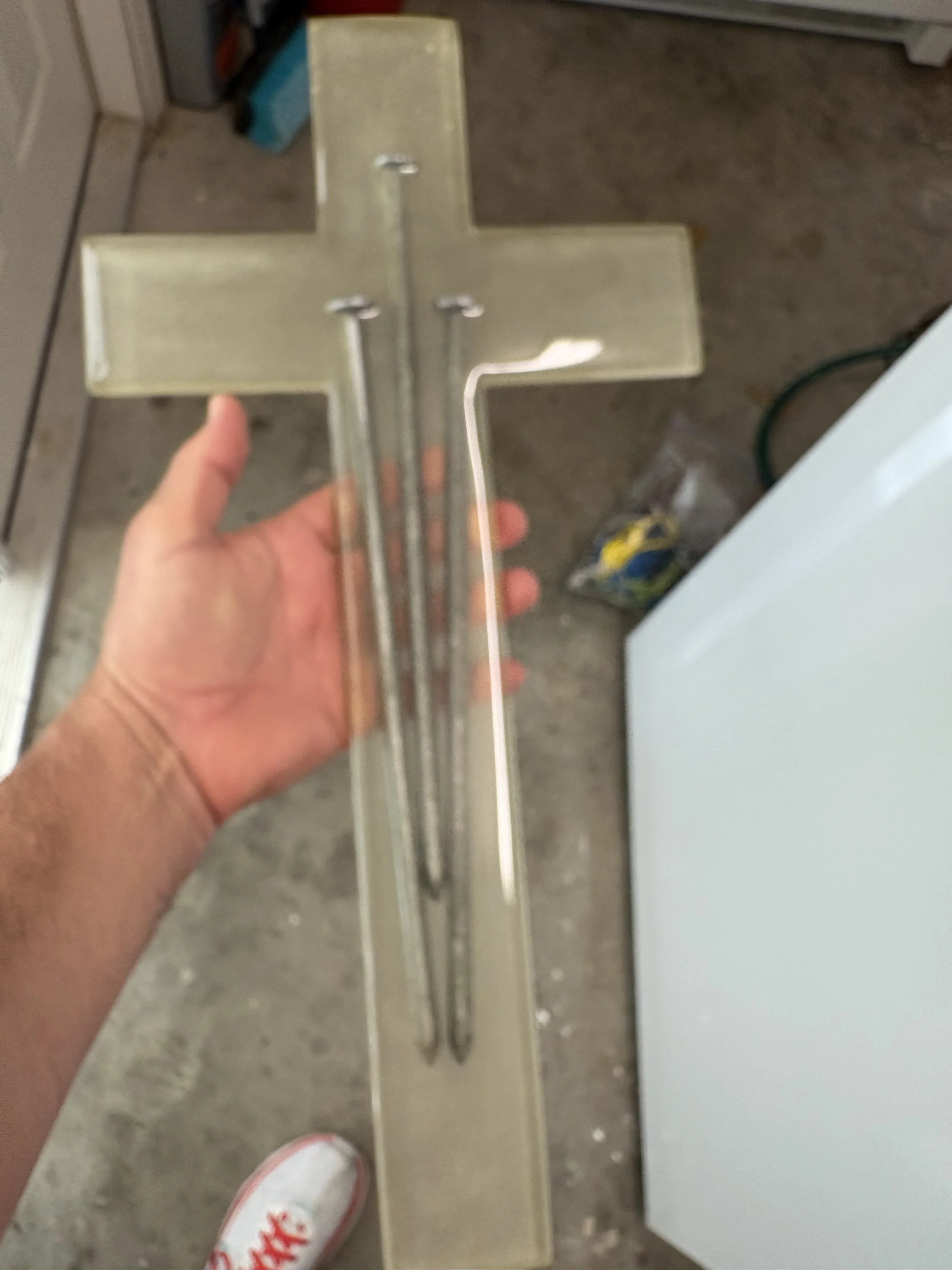 Large epoxy cross with nails