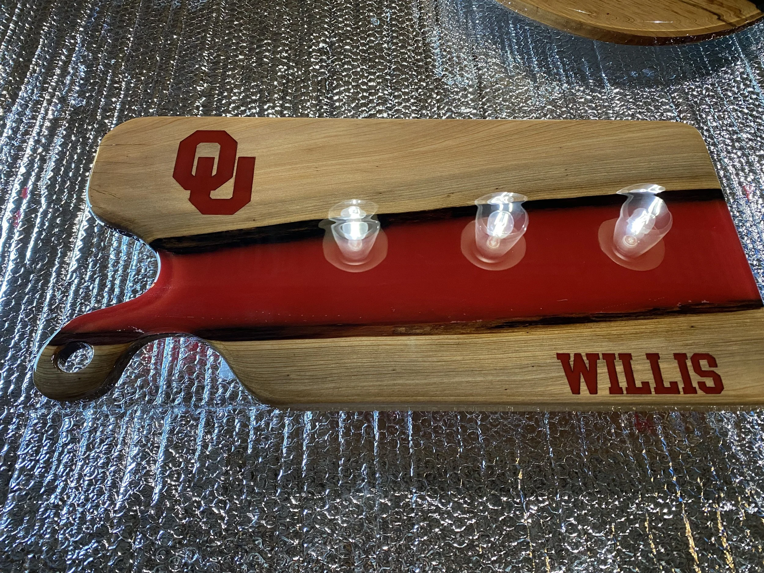 custom sinker cypress charcuterie board with red epoxy