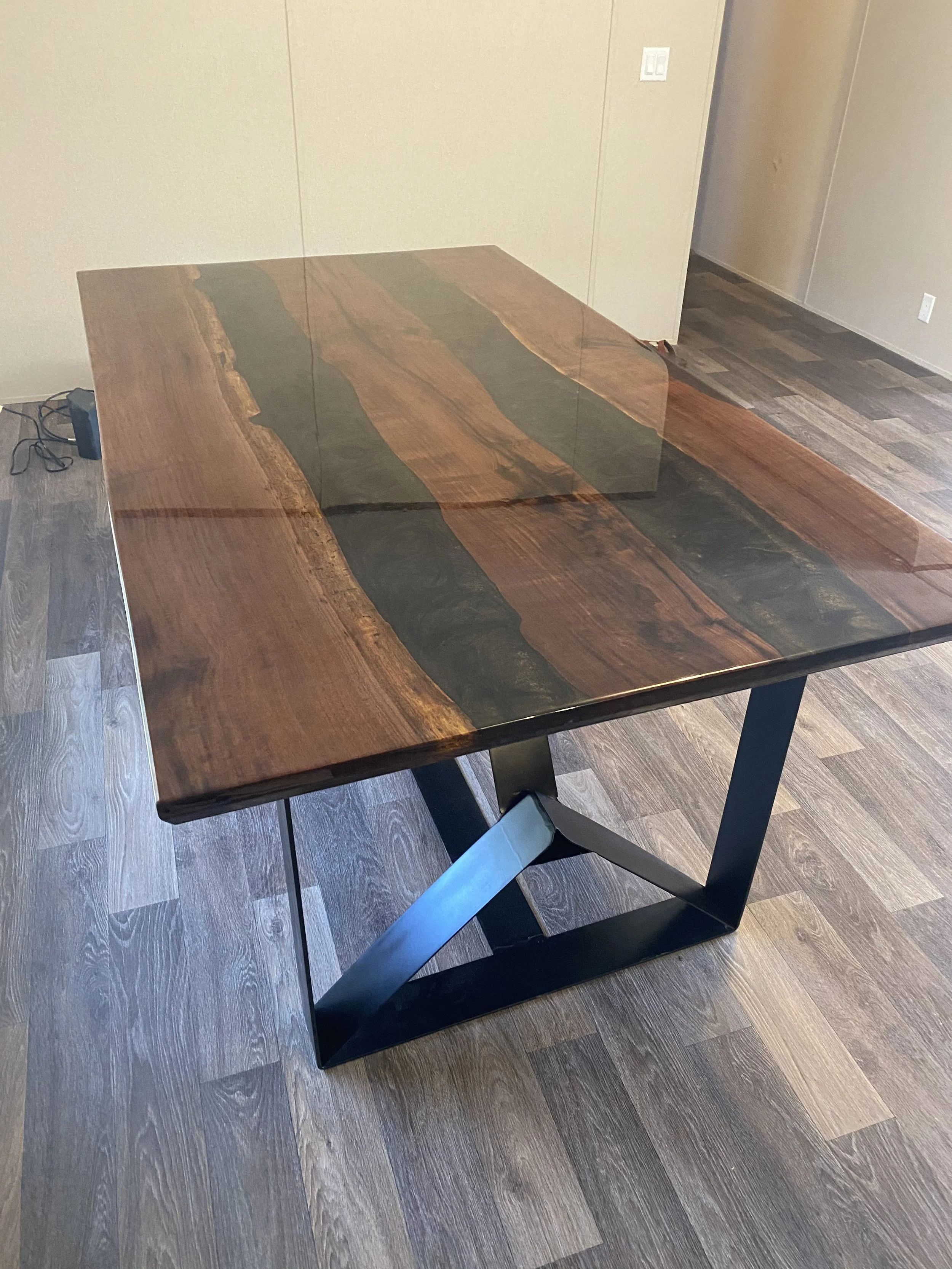 Walnut epoxy river dining table