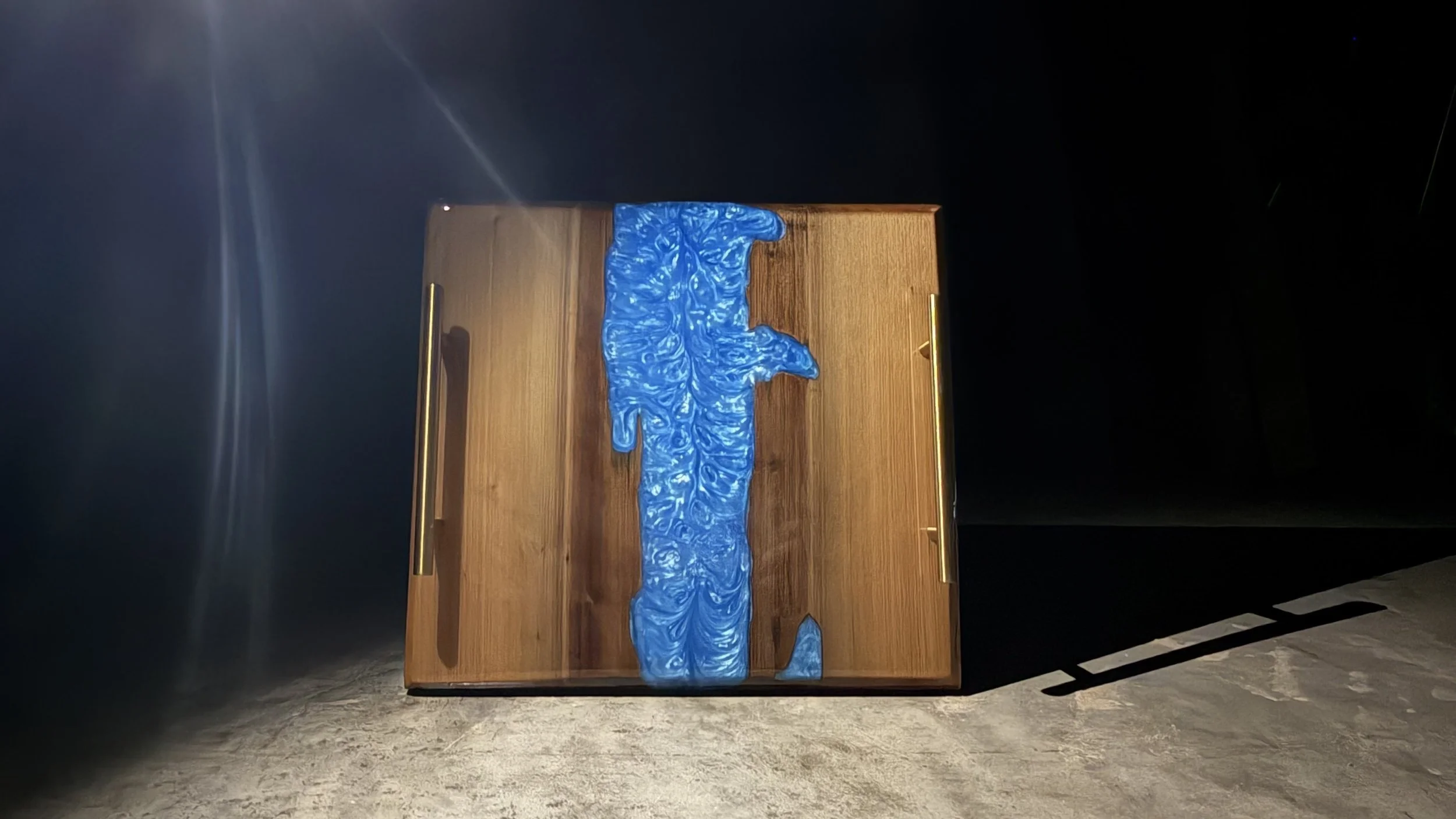 Cypress river charcuterie bard with blue epoxy.jpeg