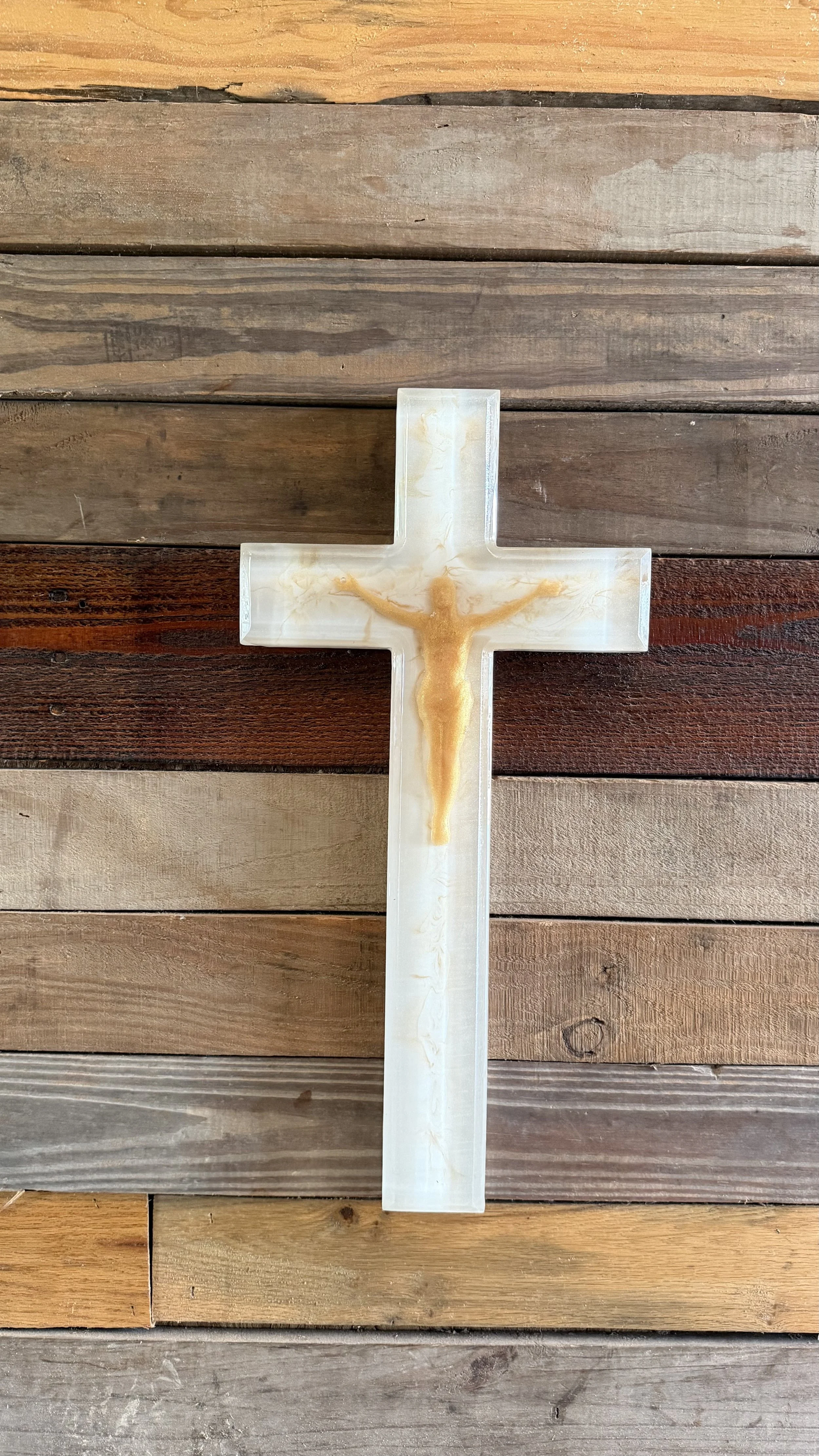 cross with imbedded corpus with white epoxy.jpeg