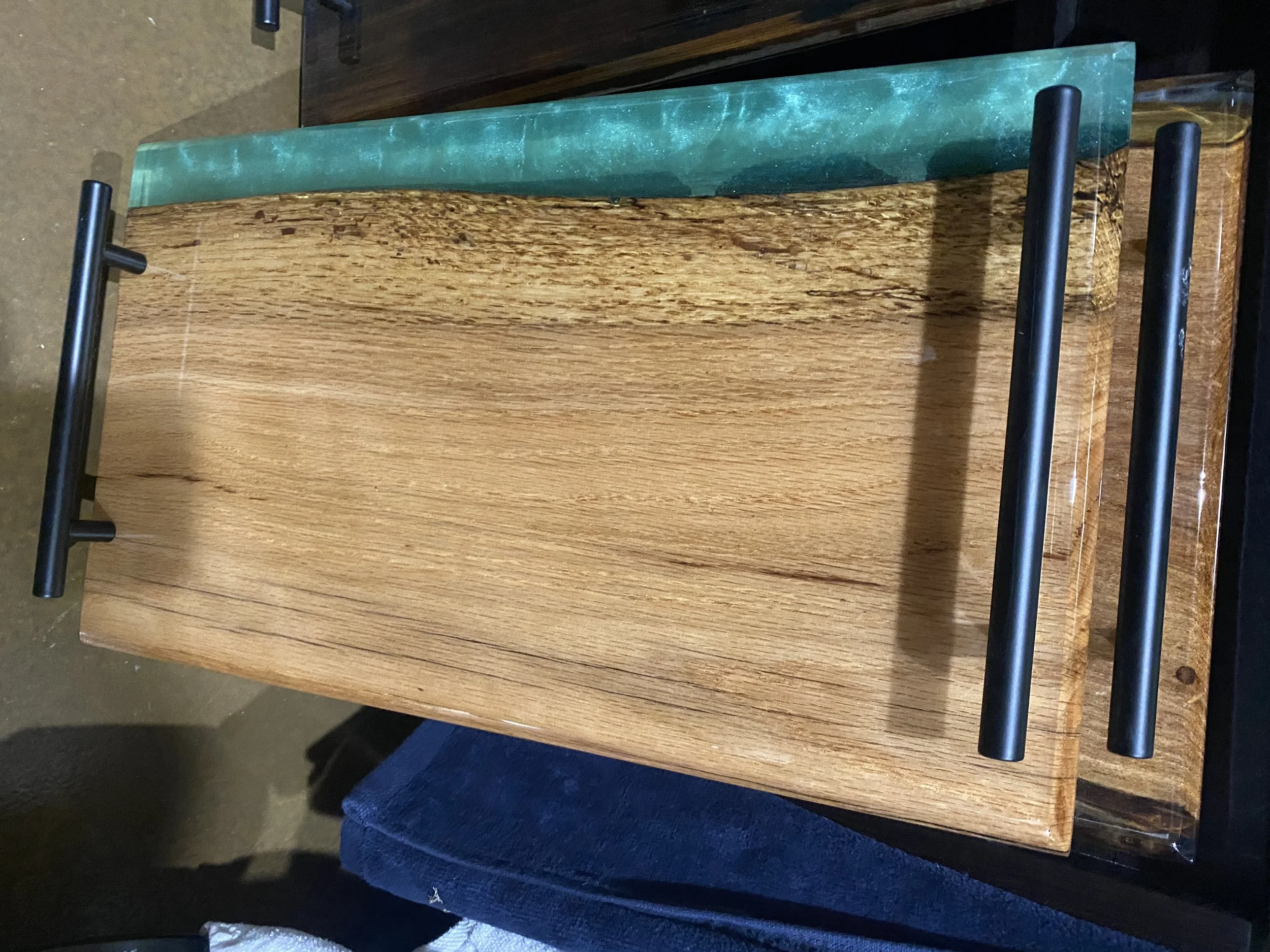 cypress charcuterie board with teal epoxy