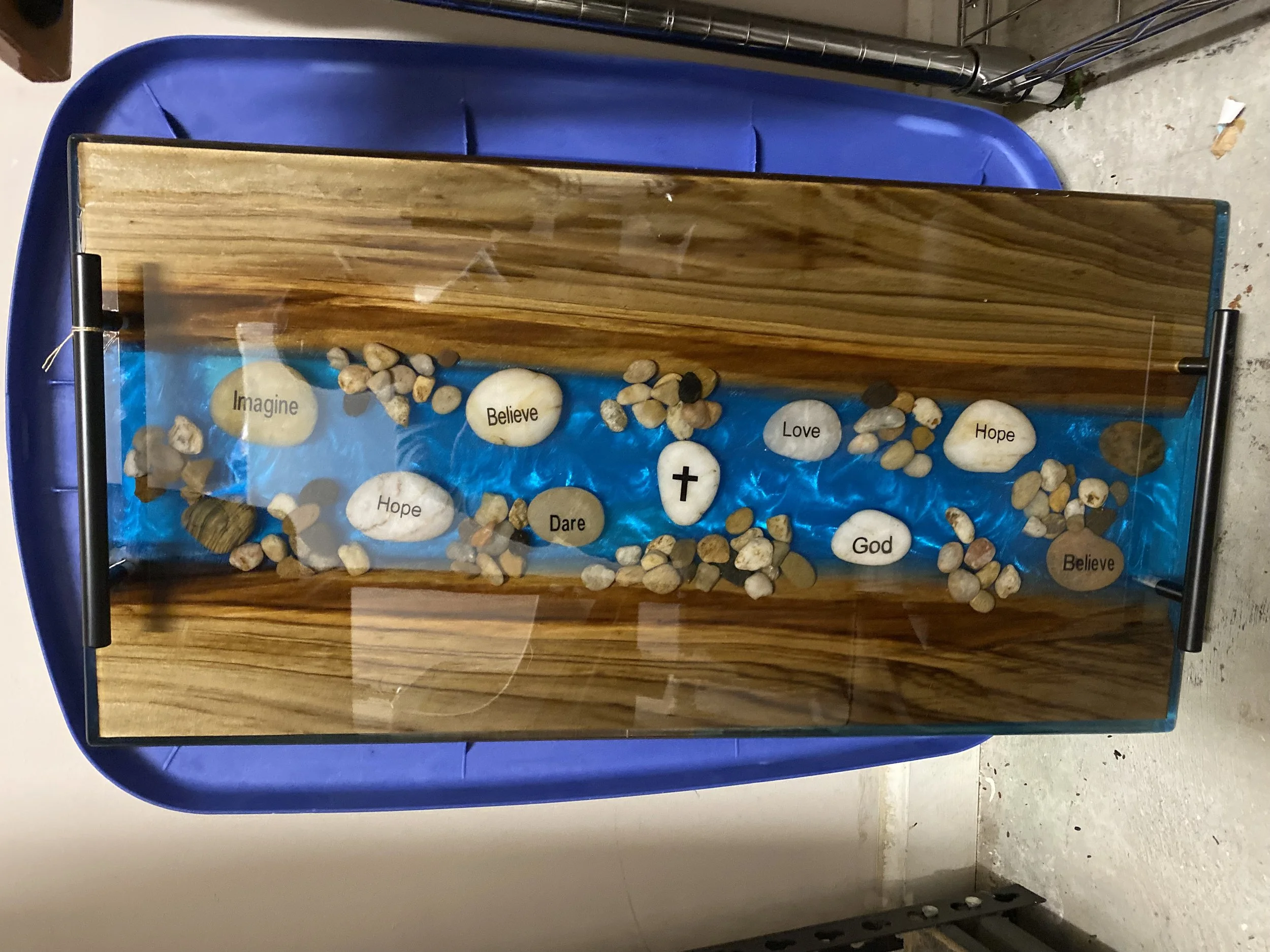 Custom cypress charcuterie board w/ blue epoxy and faith rocks