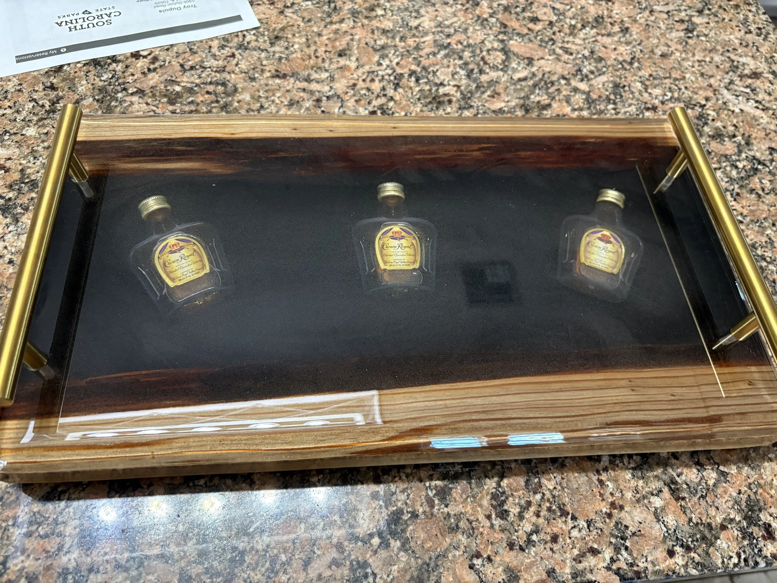 Sinker cypress with Crown Royal embedded in clear epoxy