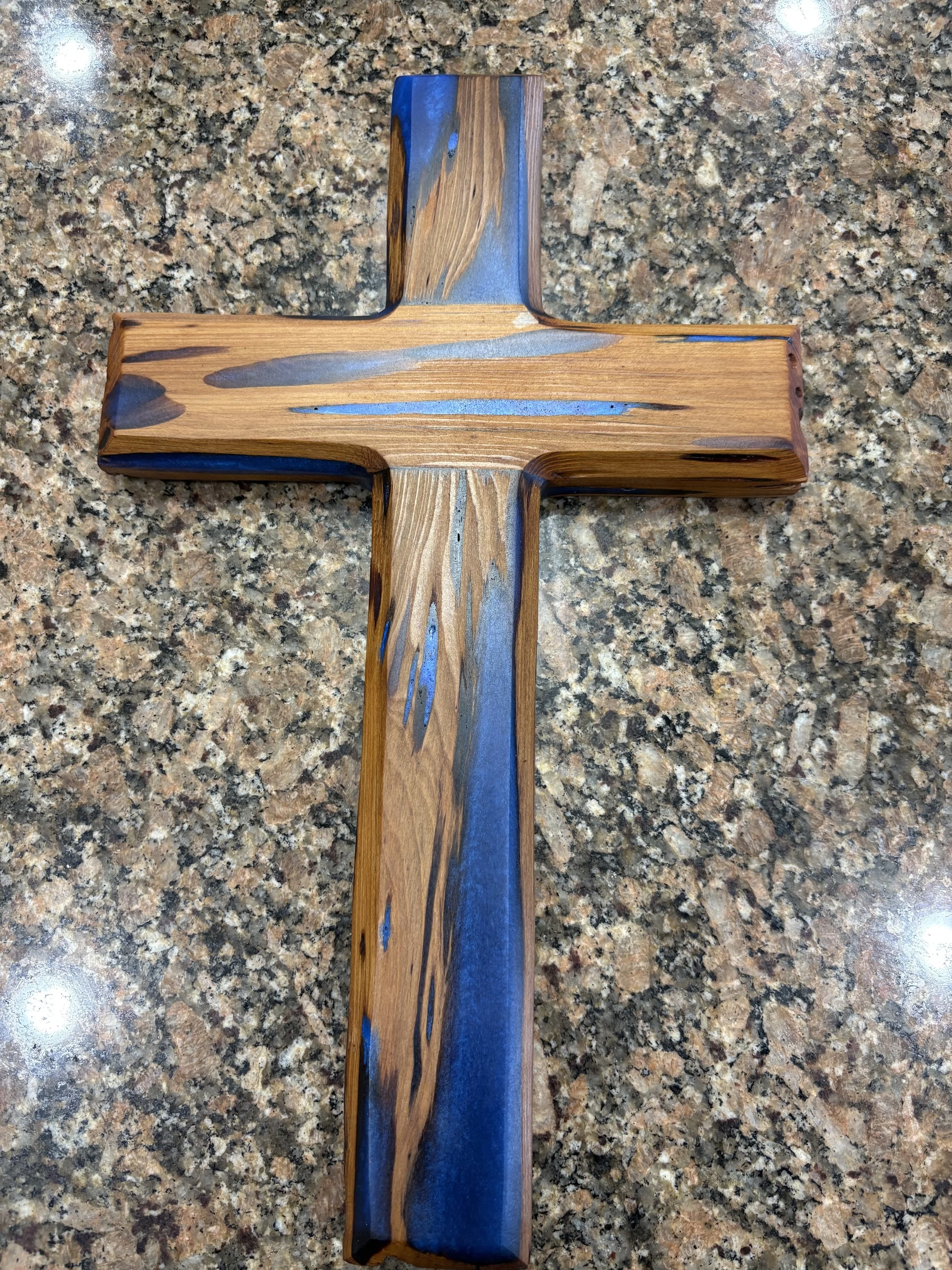 Pecky cypress cross with blue epoxy