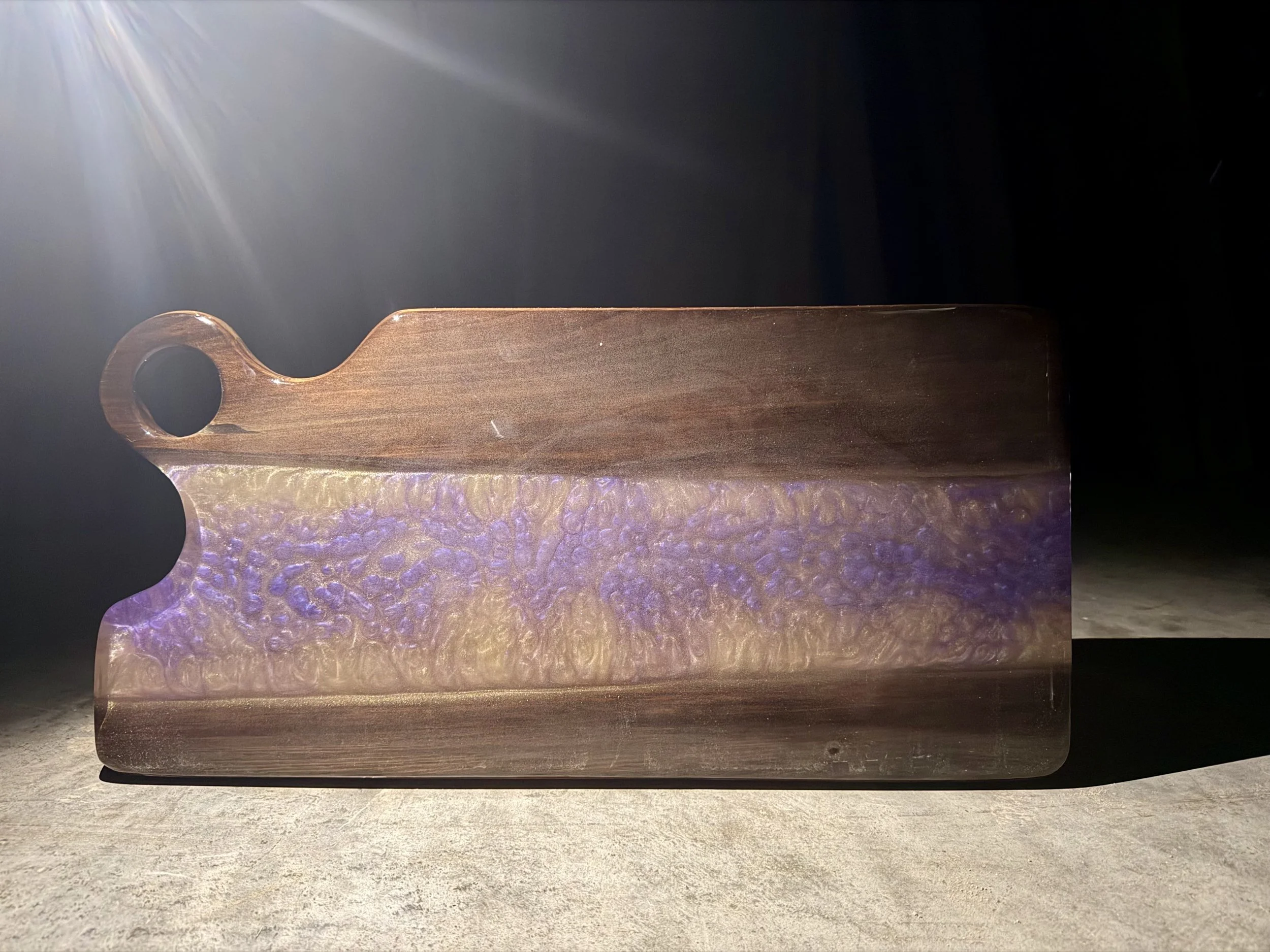 Custom sinker cypress charcuterie board with purple and gold LSU.jpeg