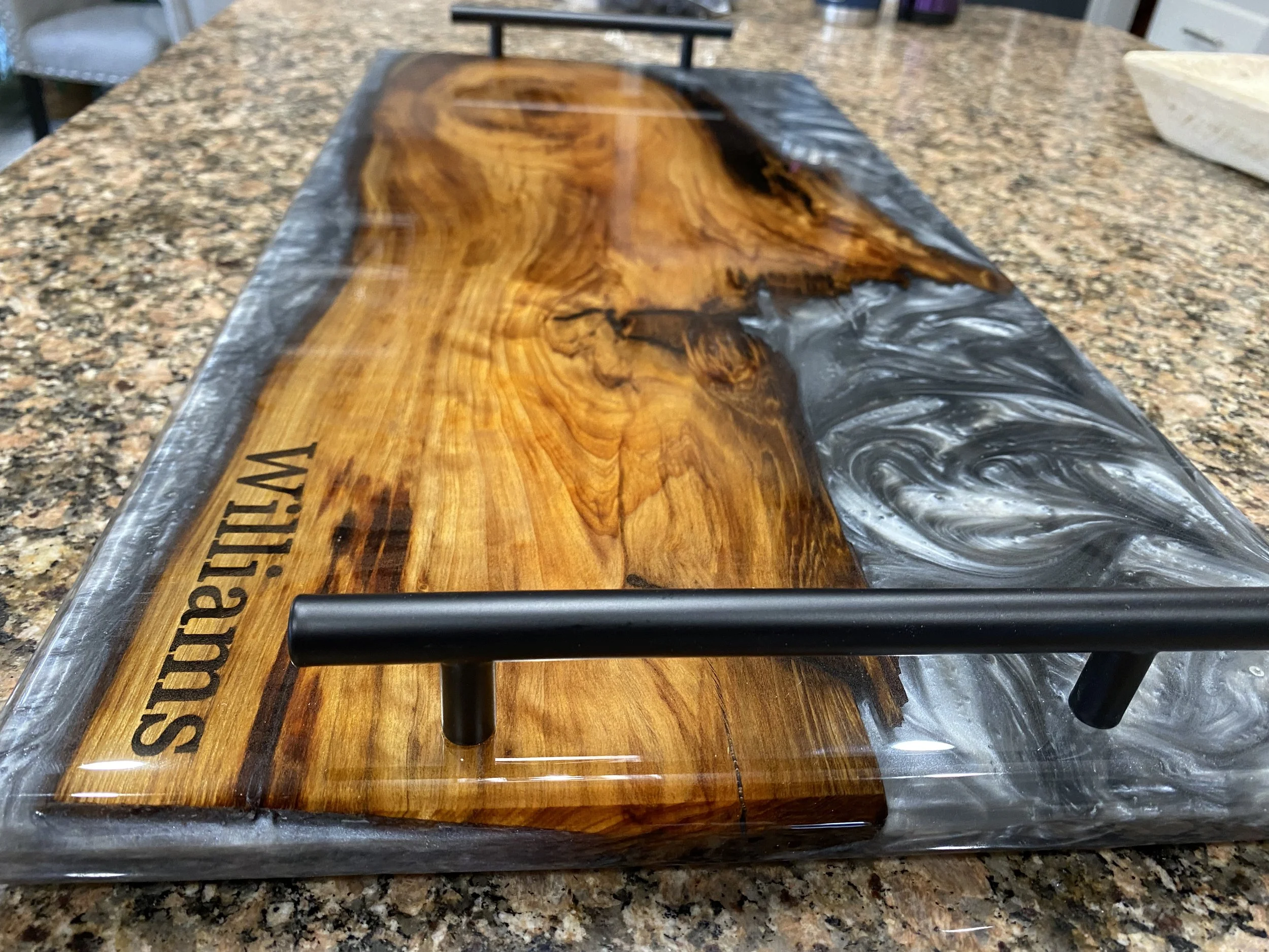 Custom sinker cypress charcuterie board with grey swirl epoxy