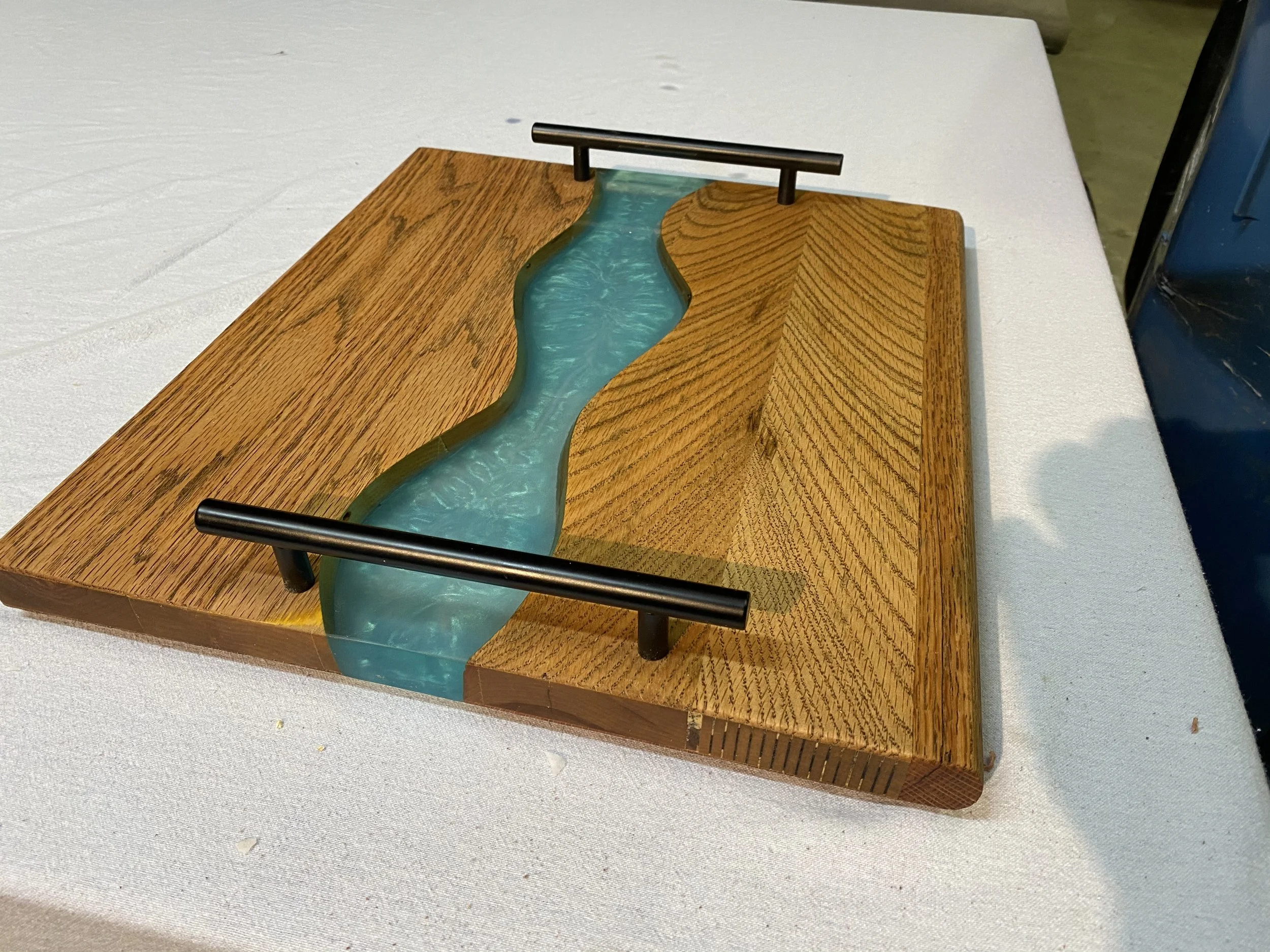 charcuterie board with teal epoxy