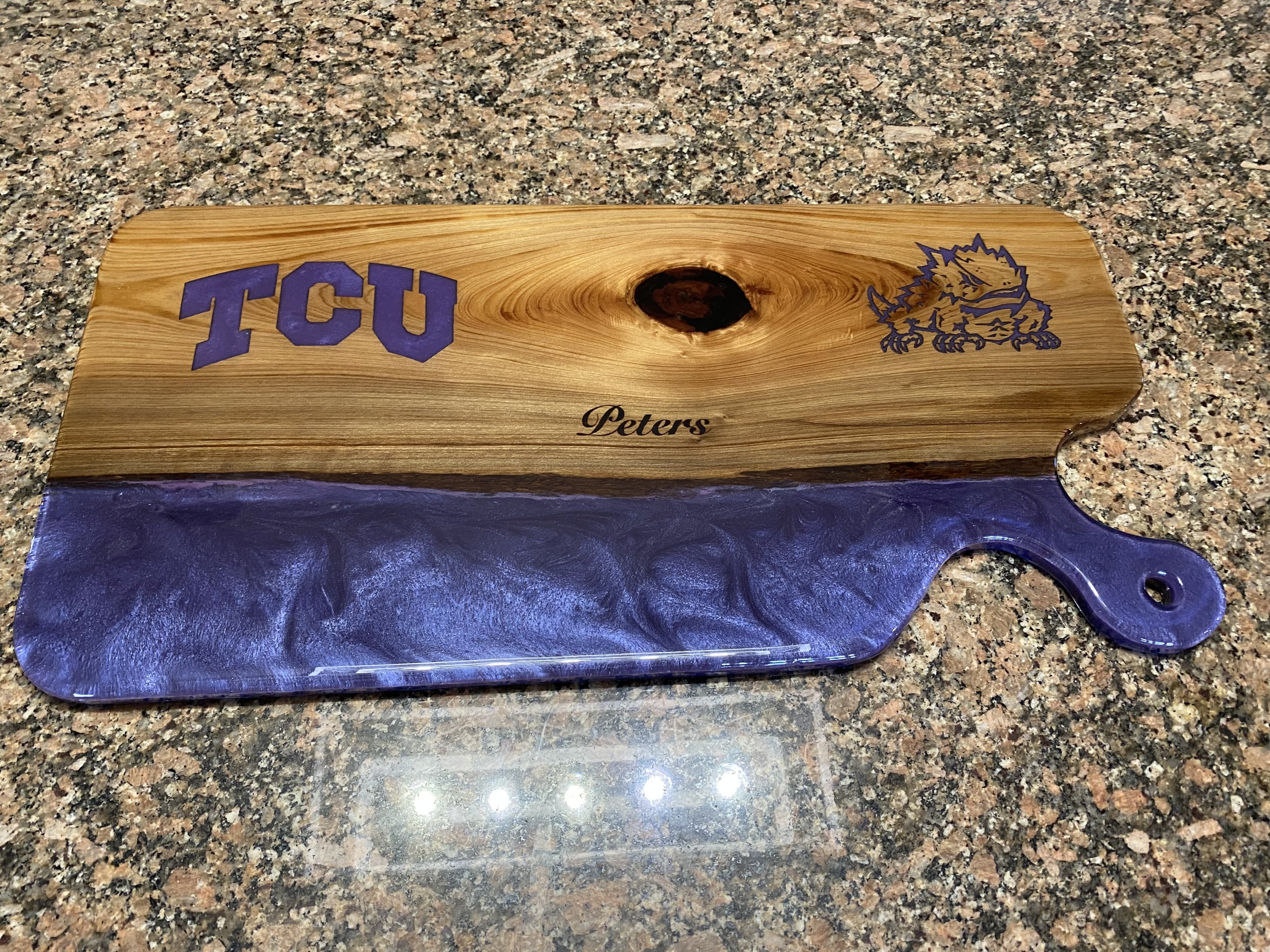 Custom sinker cypress charcuterie board with purple epoxy