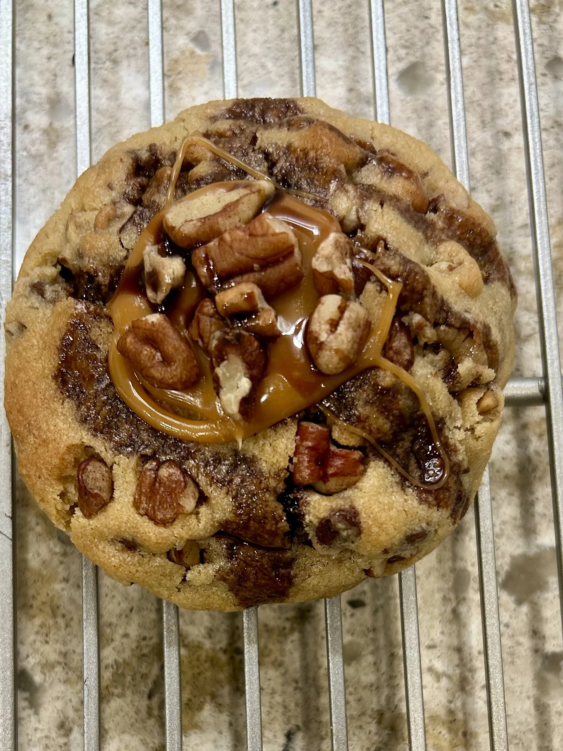 “Turtle” stuffed caramel pecan cookie