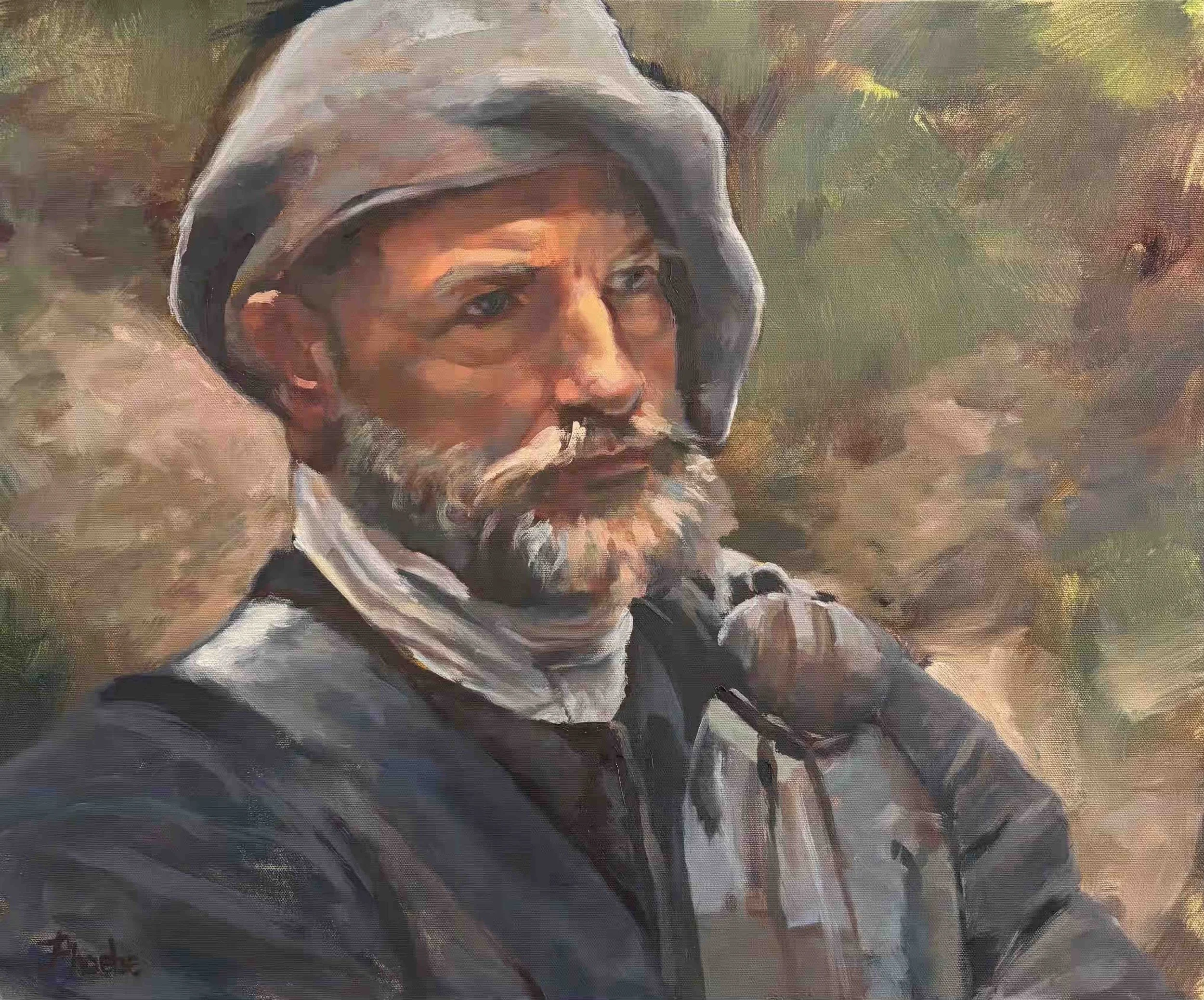 A portrait of an elderly man with a gray beard and mustache, wearing a gray hoodie, against a blurred natural background.