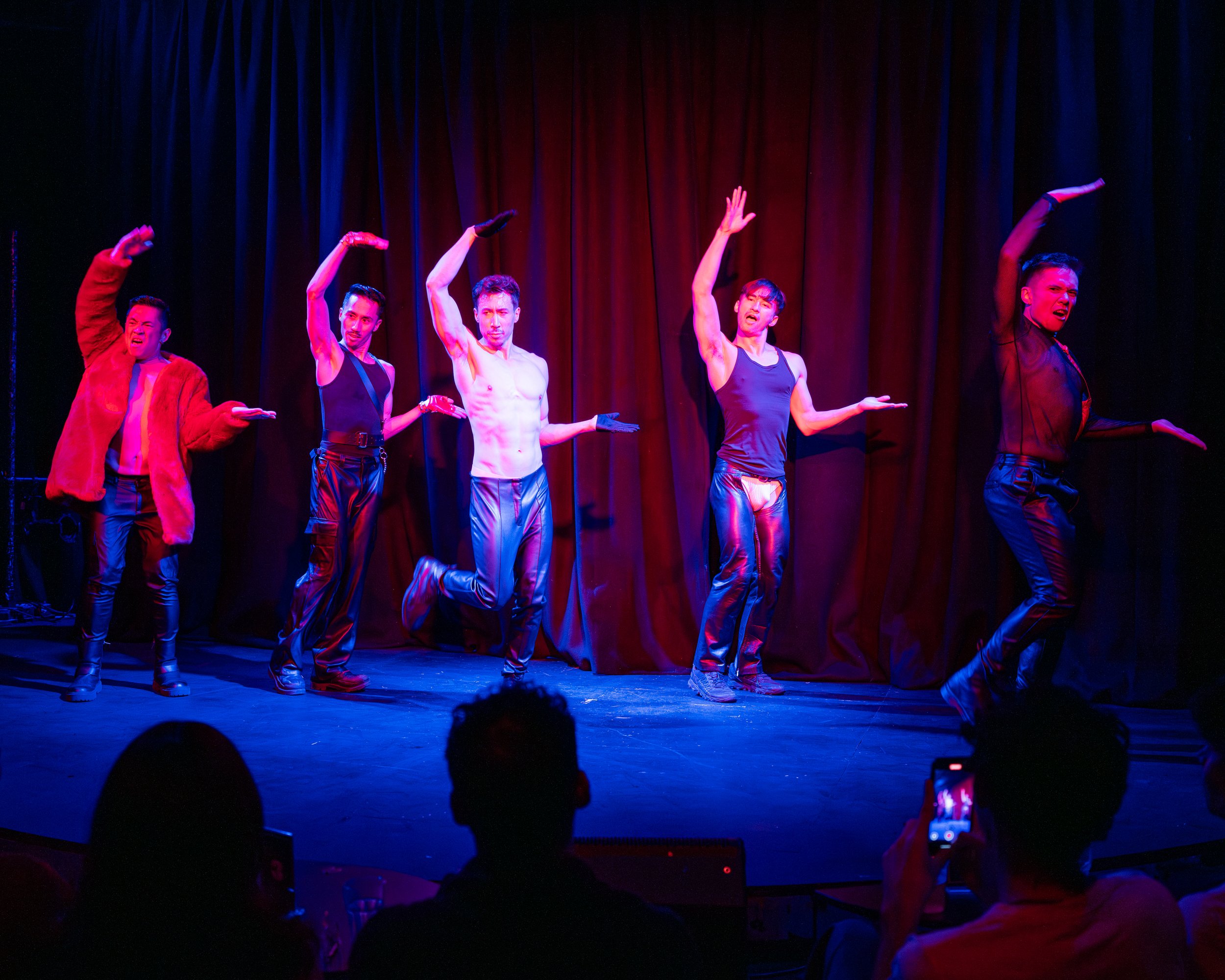 Dragon Boiz queer Asian cabaret performers dancing on stage at a live show