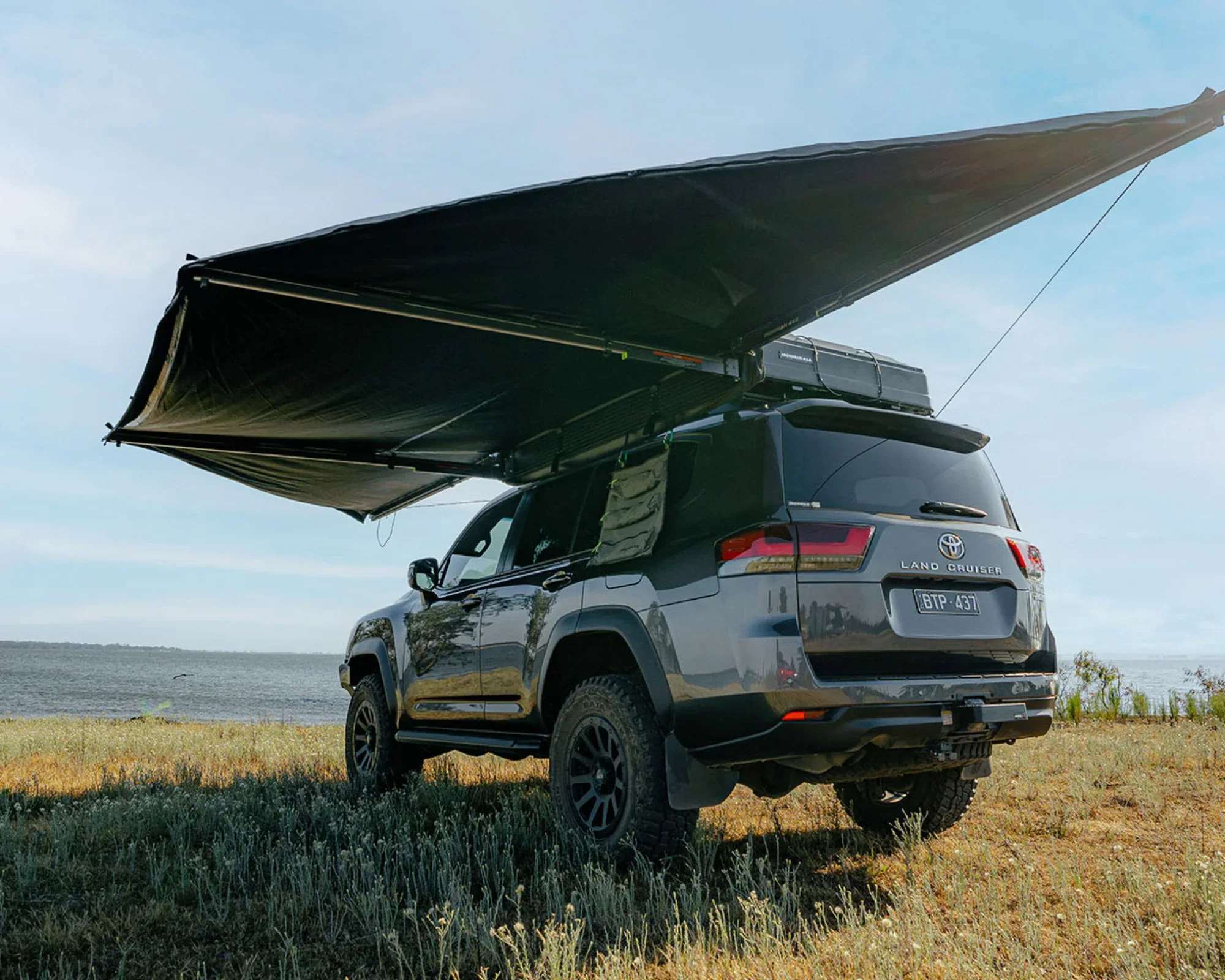 IAWN180-DeltaWing-180-degree-Awning-2.webp