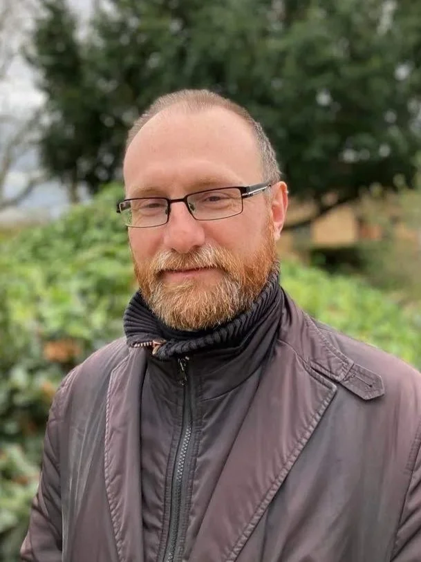 Photo of Nick Dommett, Integrative Psychotherapist, standing outdoors.