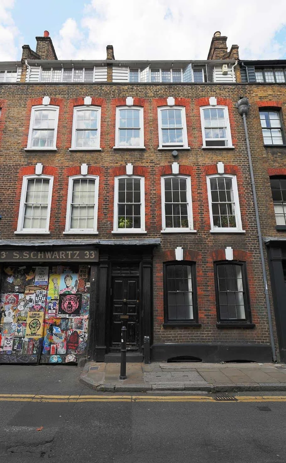 Exterior brick building and street view of Calm Harbour Therapy room in East London.