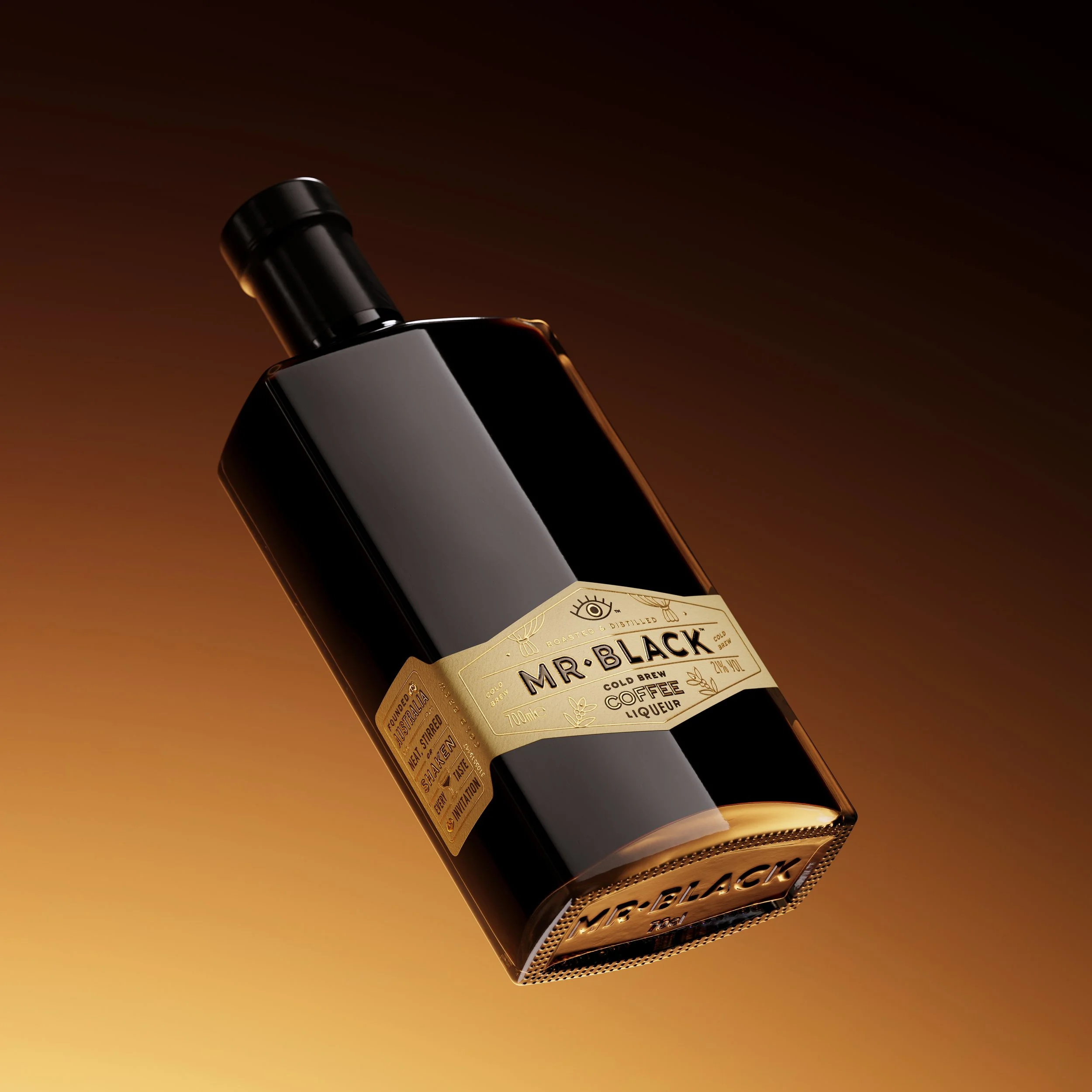 Close-up of a dark glass bottle with a gold label reading 'Mr. Black Coffee Liqueur' against a gradient brown-orange background.