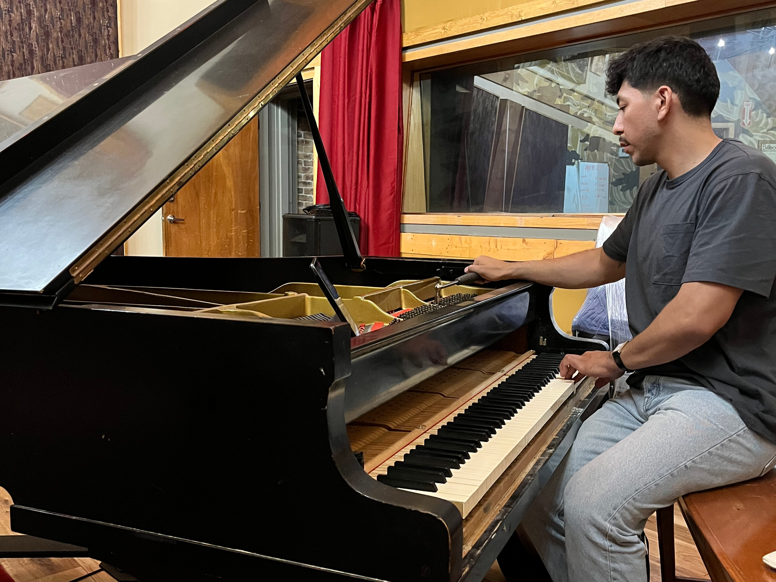 Me tuning a Yamaha grand at Sugar Hill Recording Studios