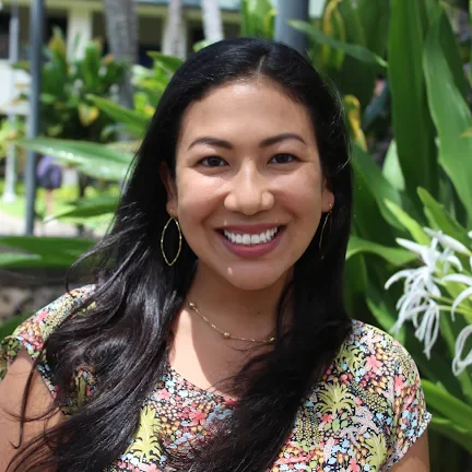 A woman with a bright smile